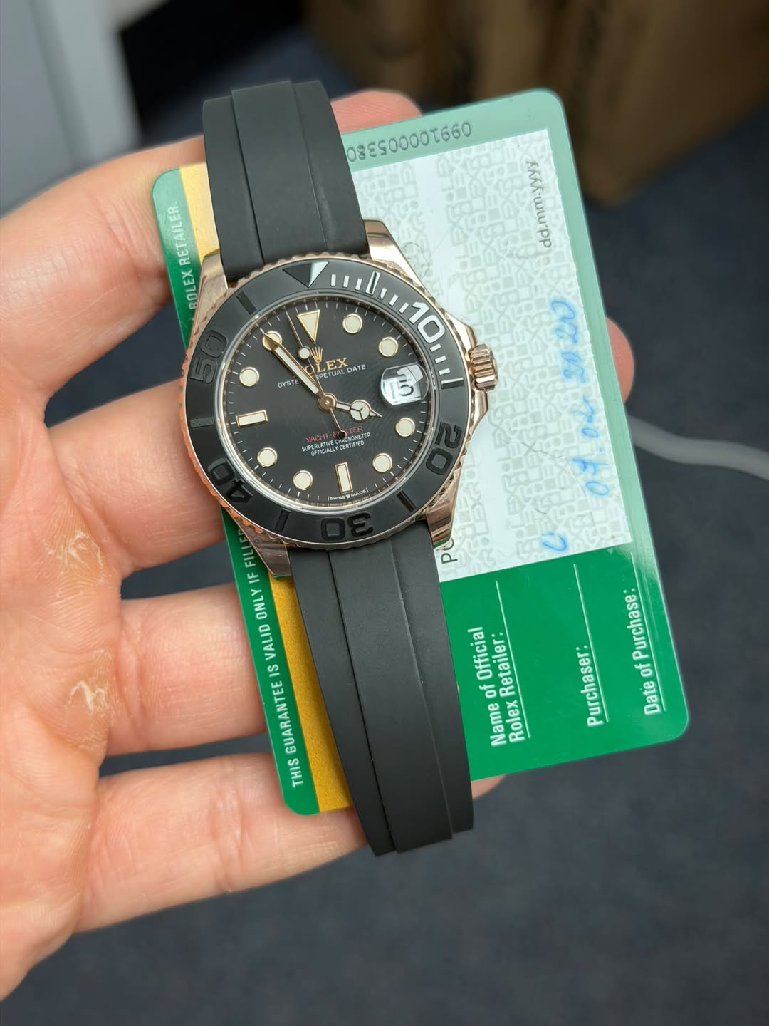 May be an image of wrist watch and text that says ' RETAILER ROLEX Kau ILE 10ス TUMDATE DATE 1 ET QY57L 10 ち иmAc mm.yyyy dd. 02: O2H 0f Pd P Purchase: Purchaser: of Date FIL IF…