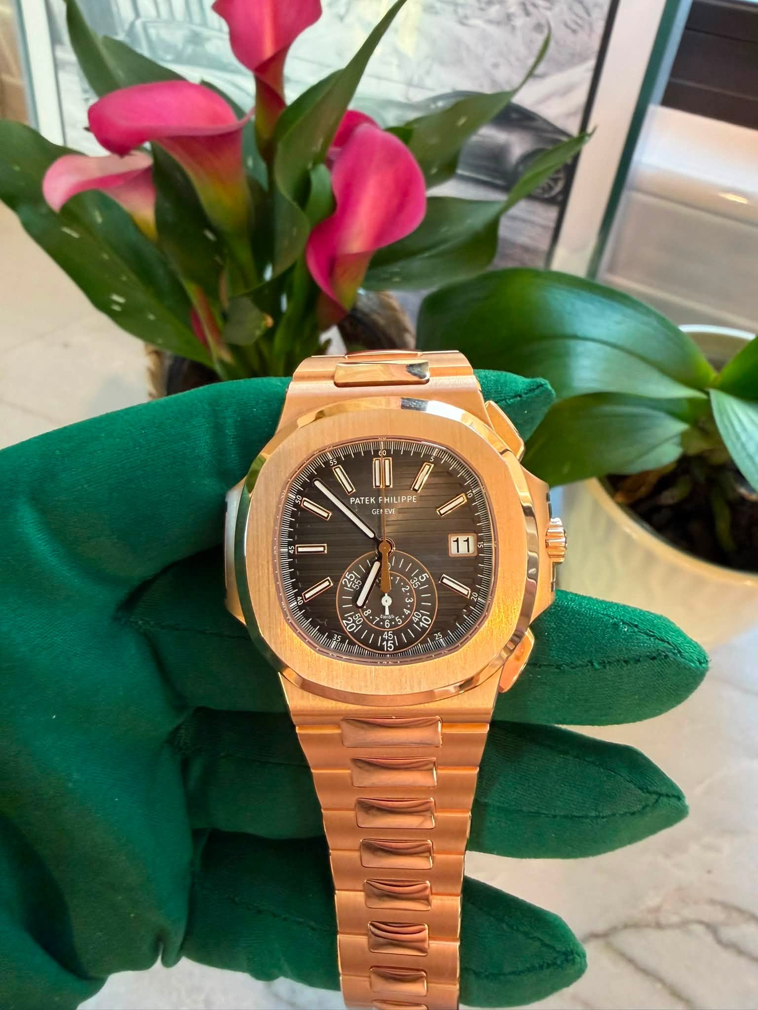 May be an image of wrist watch and text