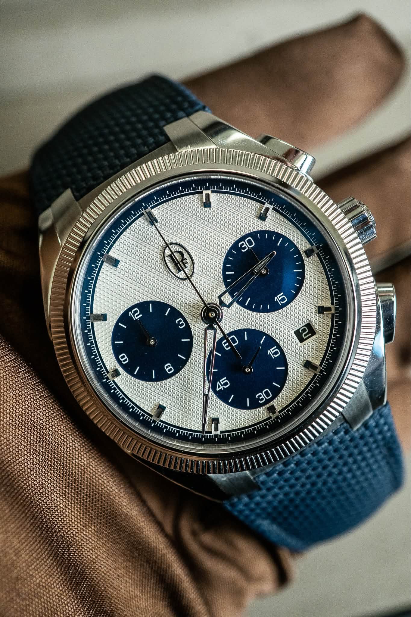 May be an image of wrist watch and text