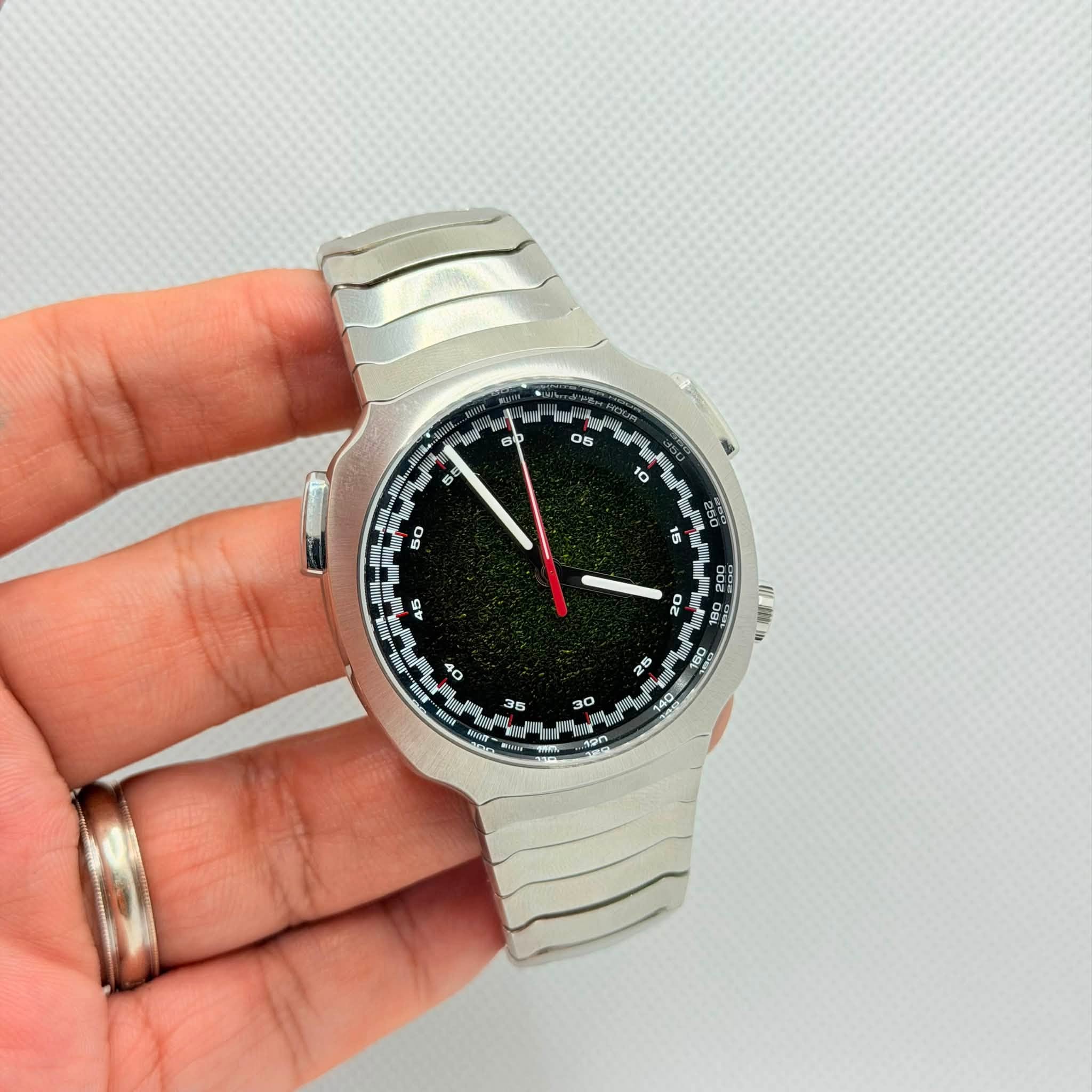 May be an image of digital watch and text