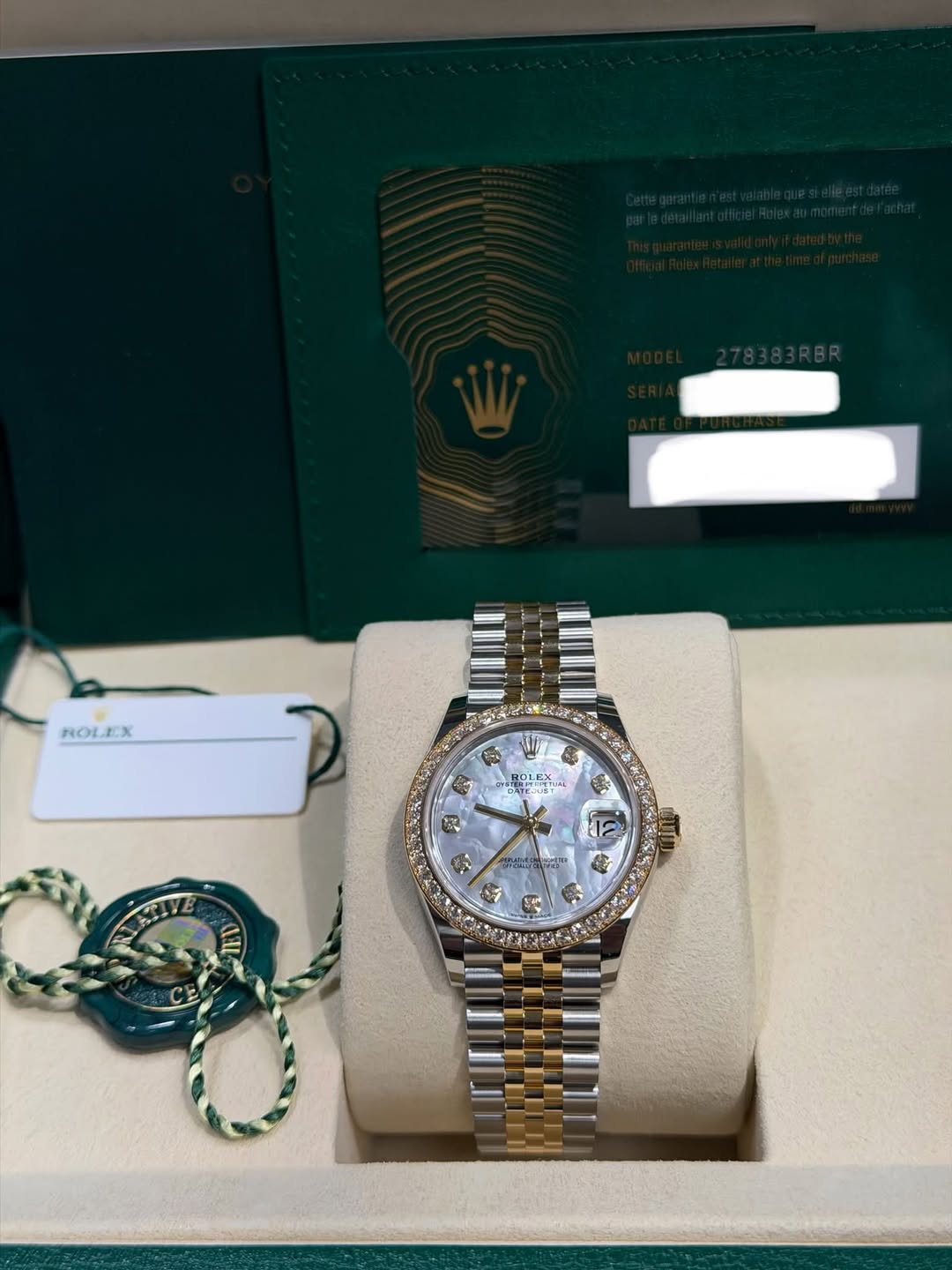May be an image of wrist watch and text