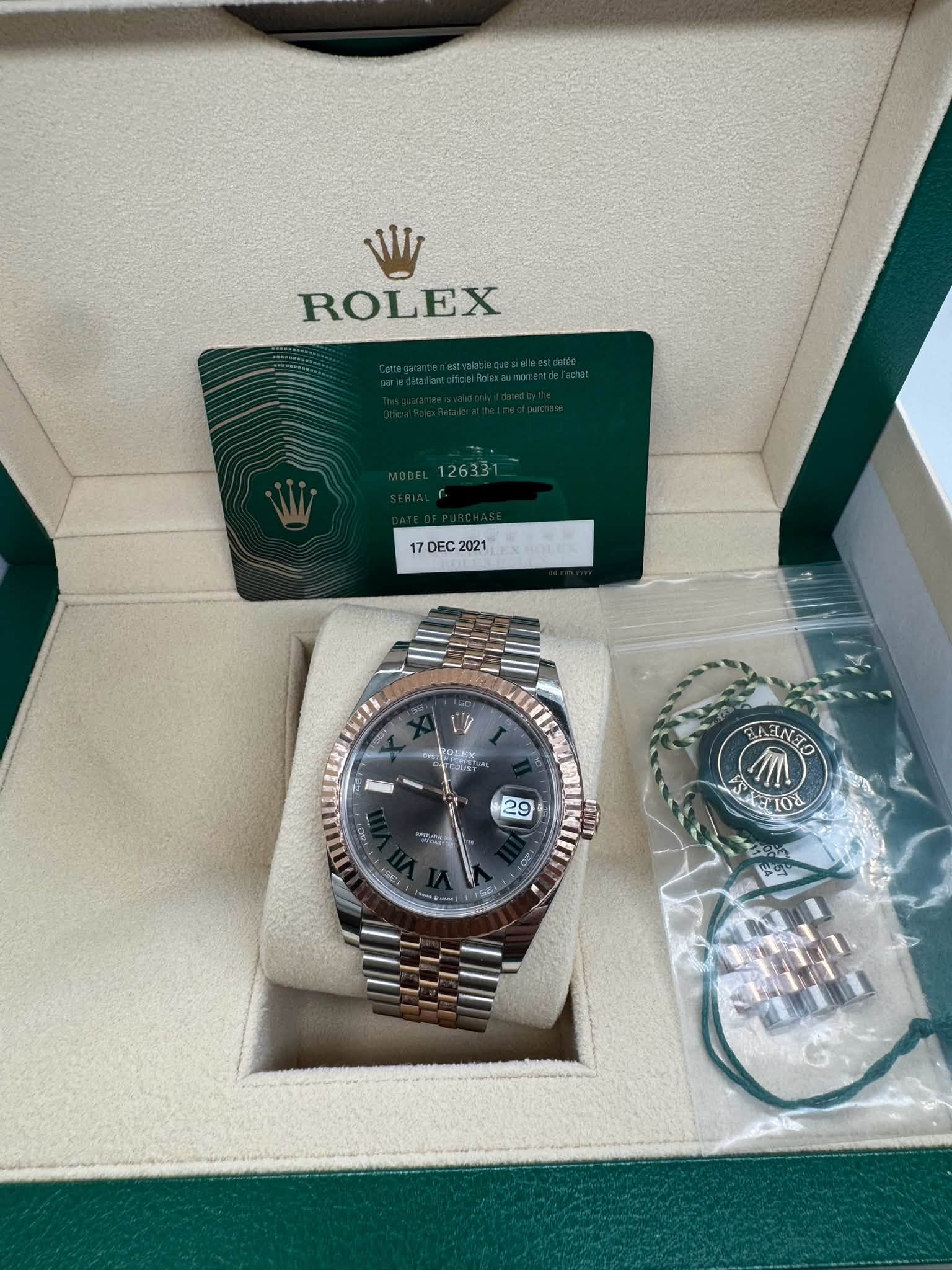 May be an image of wrist watch and text that says 'W ROLEX 126331 17DEC2021 DEC 2021 LEL KRLEX 29 2 AD R BNENEO I 10 ੰ ၂ာ মणव 10% צש'