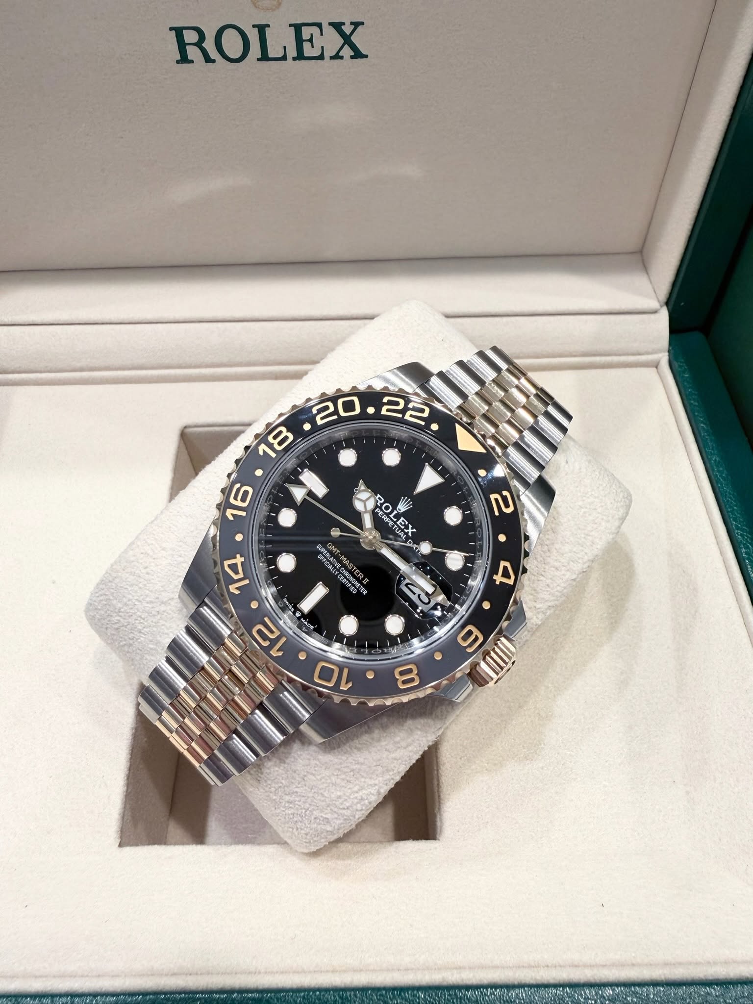 May be an image of wrist watch and text