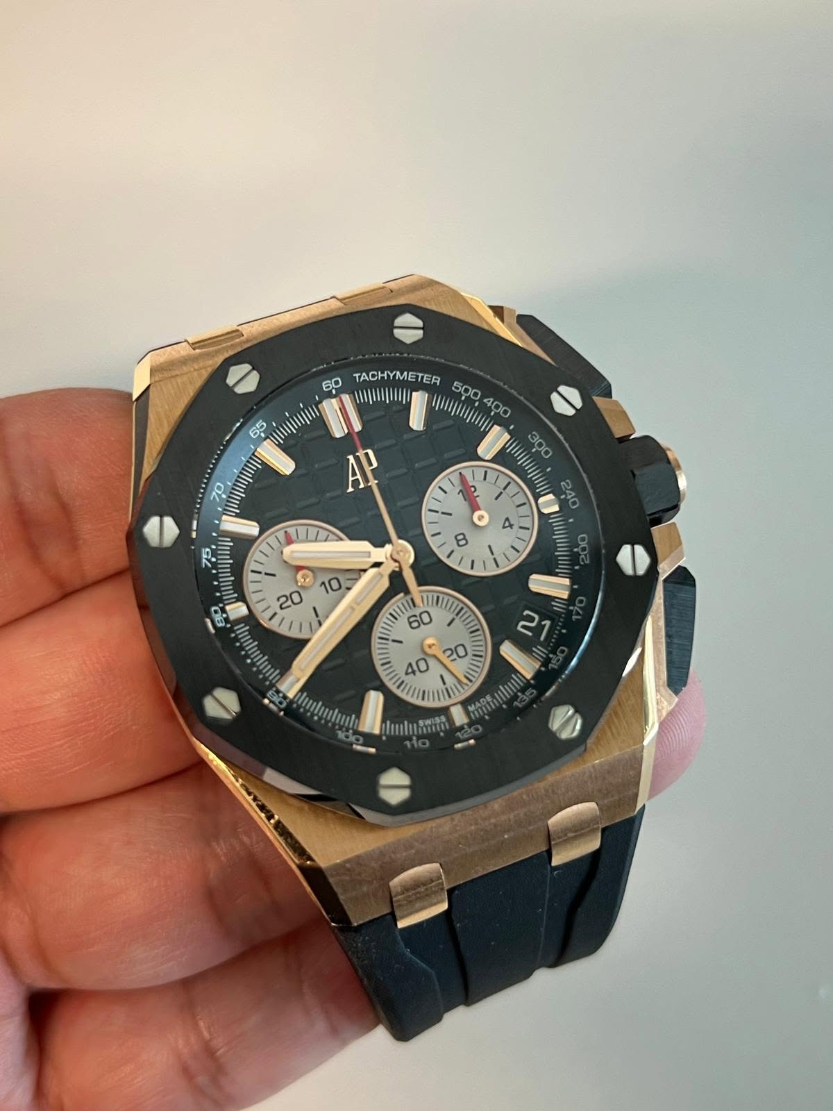 May be an image of wrist watch and text