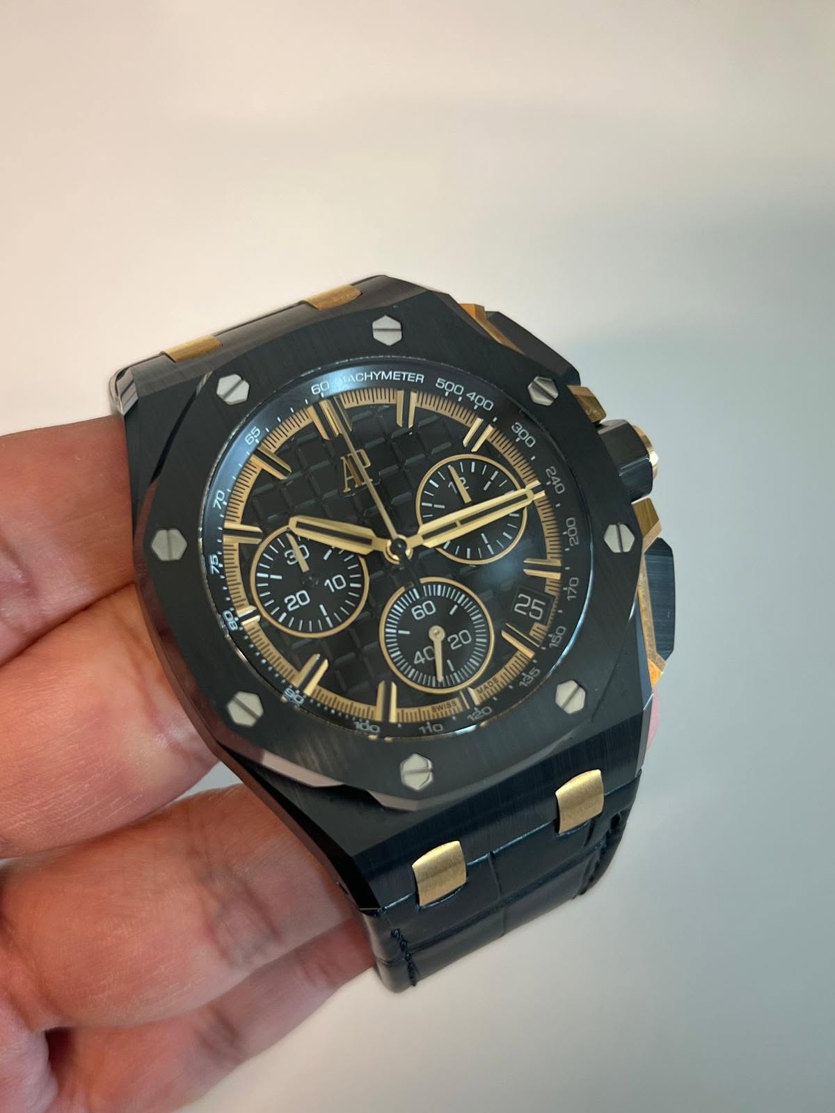 May be an image of wrist watch and text