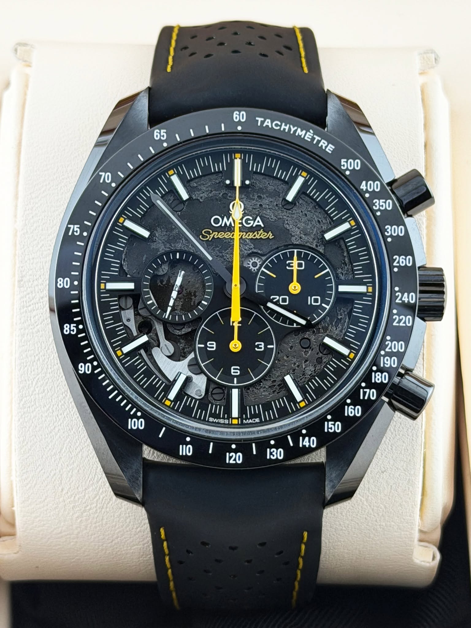 May be an image of digital watch and text that says '65 70 60 TACHYMETRE 500 Il "ח.. OMEGA GA OM Speednaster Speed naster + + 3 6 G im 100 I RYA SwissI MADE 110 / 20 I30'