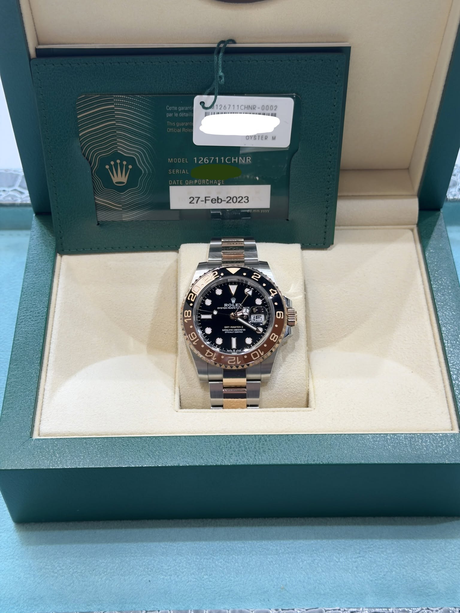 May be an image of wrist watch and text that says 'ข 126711CHNR-000 126711CHNR- J DYSTER M 12671 126711CHNR HNR 27-Feb- ROS 台 a 배방보 가교관 6 aiü 6 ヤ 00 10 D V ស'