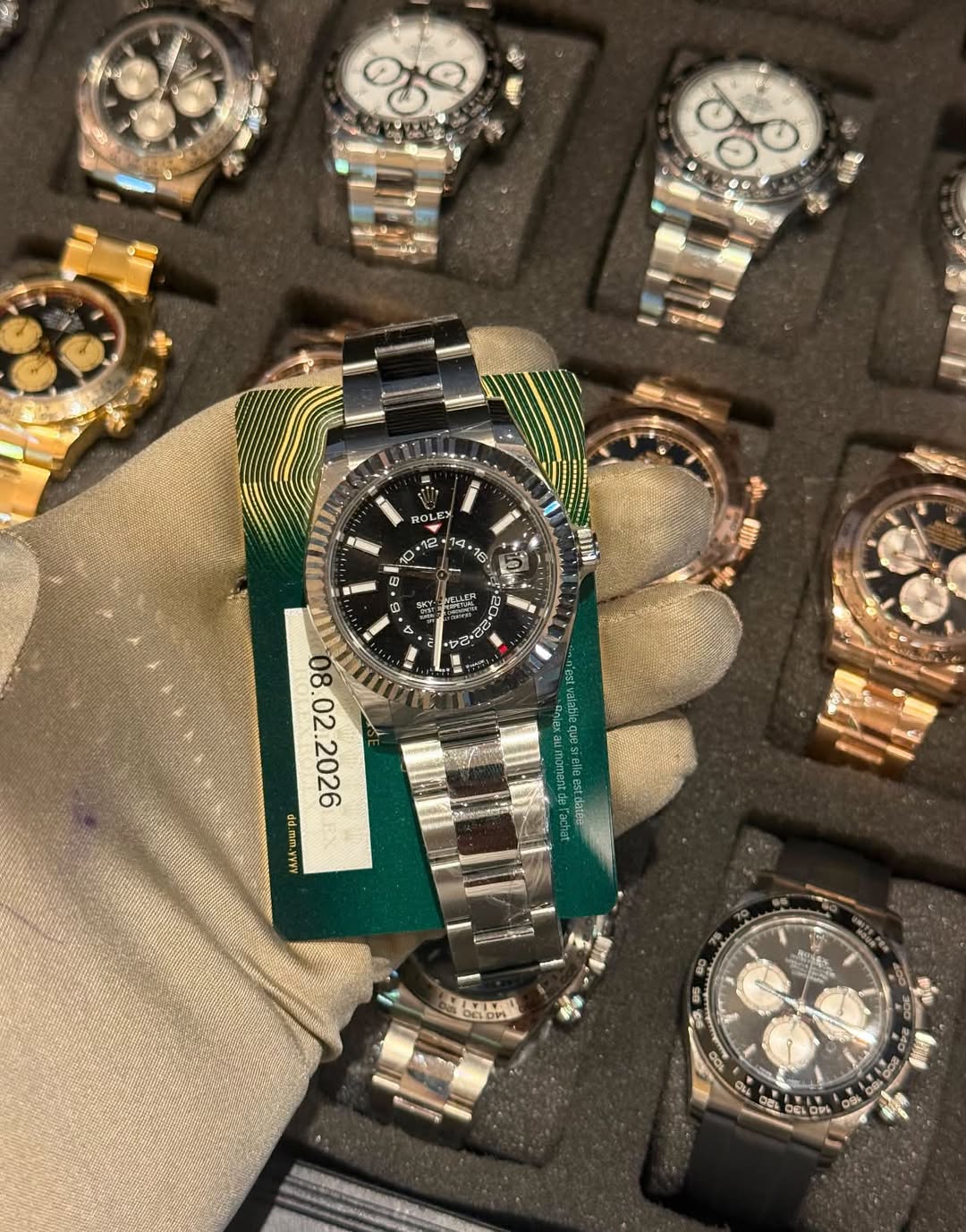 May be an image of wrist watch and text