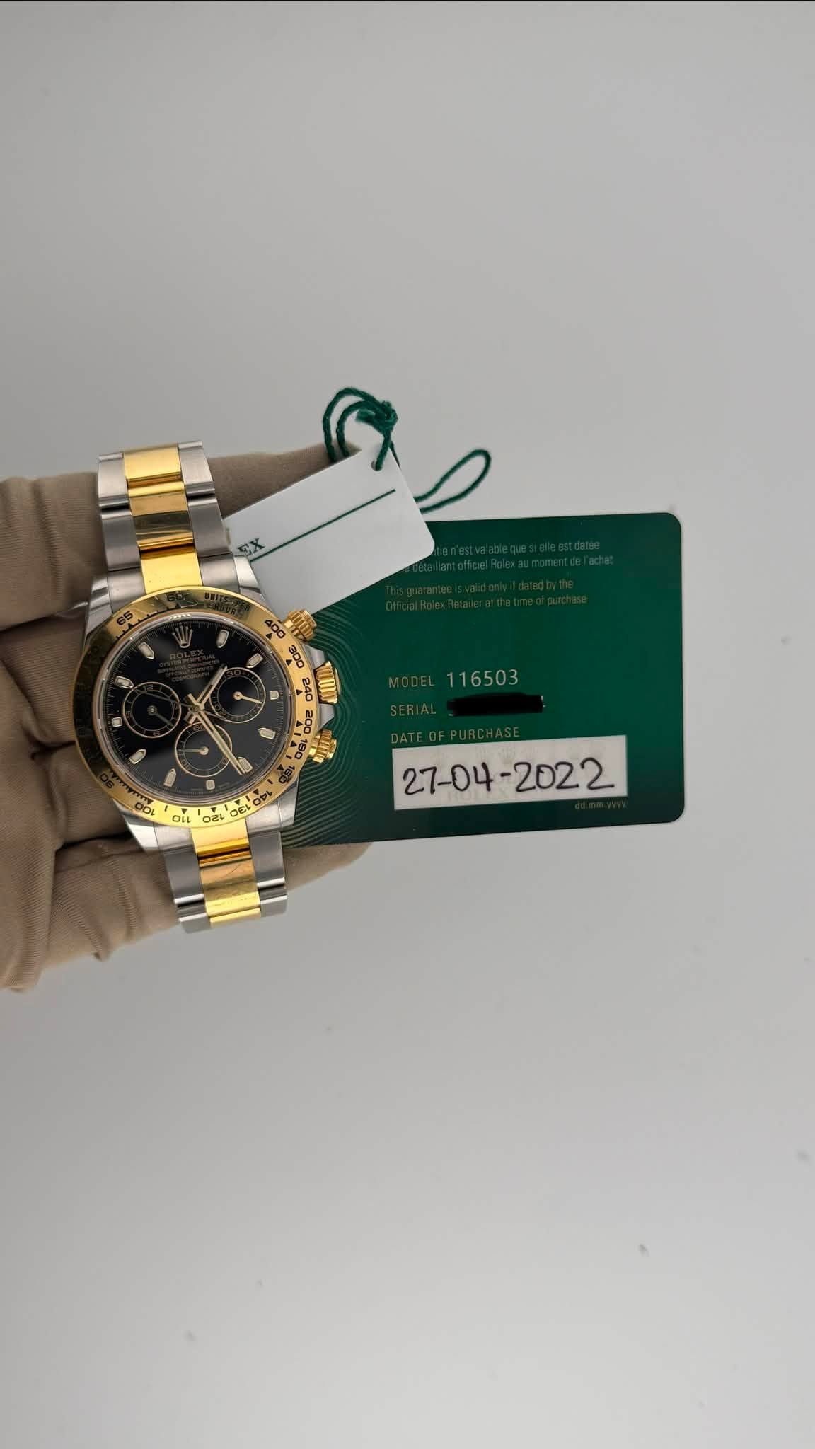 May be an image of wrist watch and text