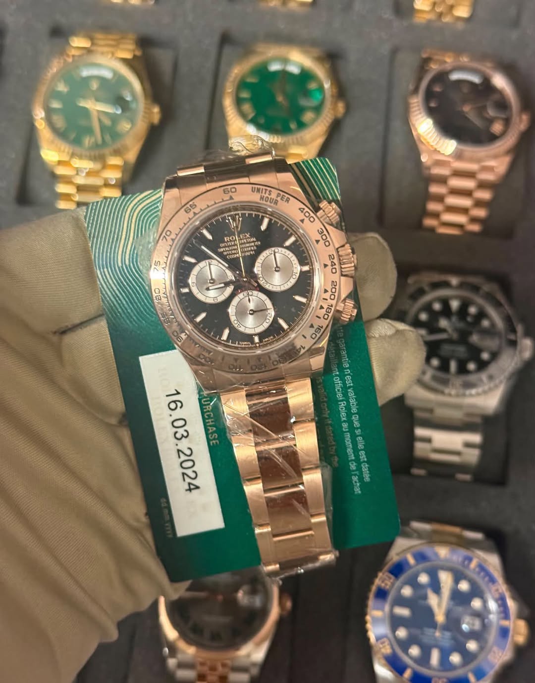 May be an image of wrist watch and text