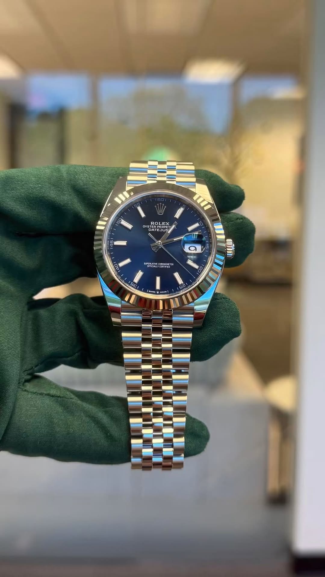 May be an image of wrist watch and text