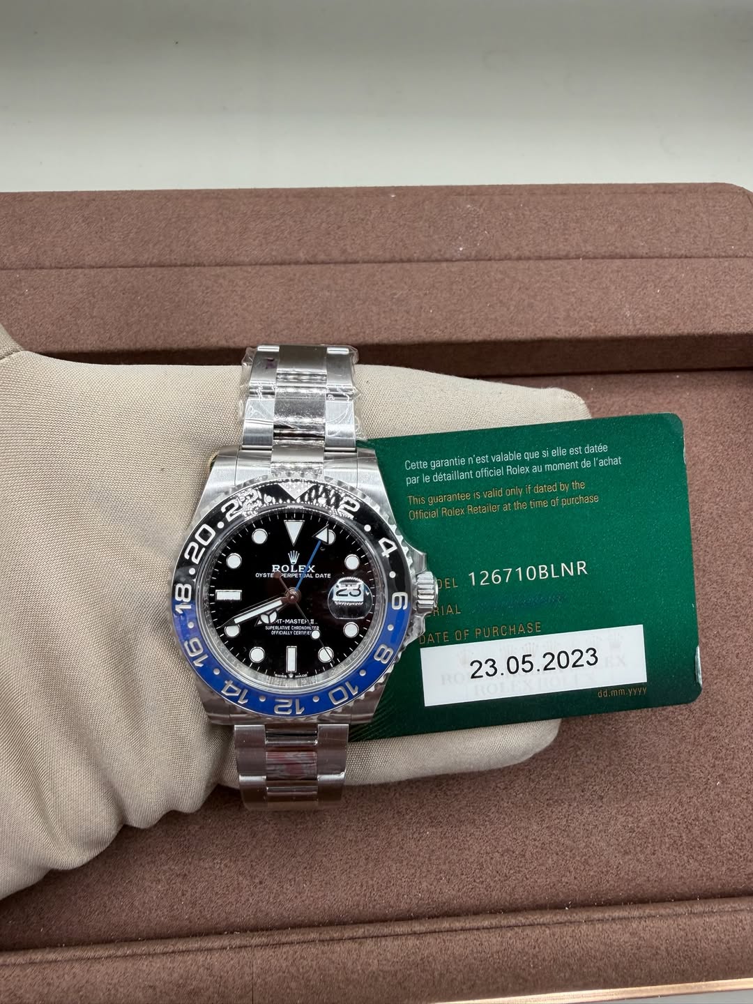 May be an image of wrist watch and text