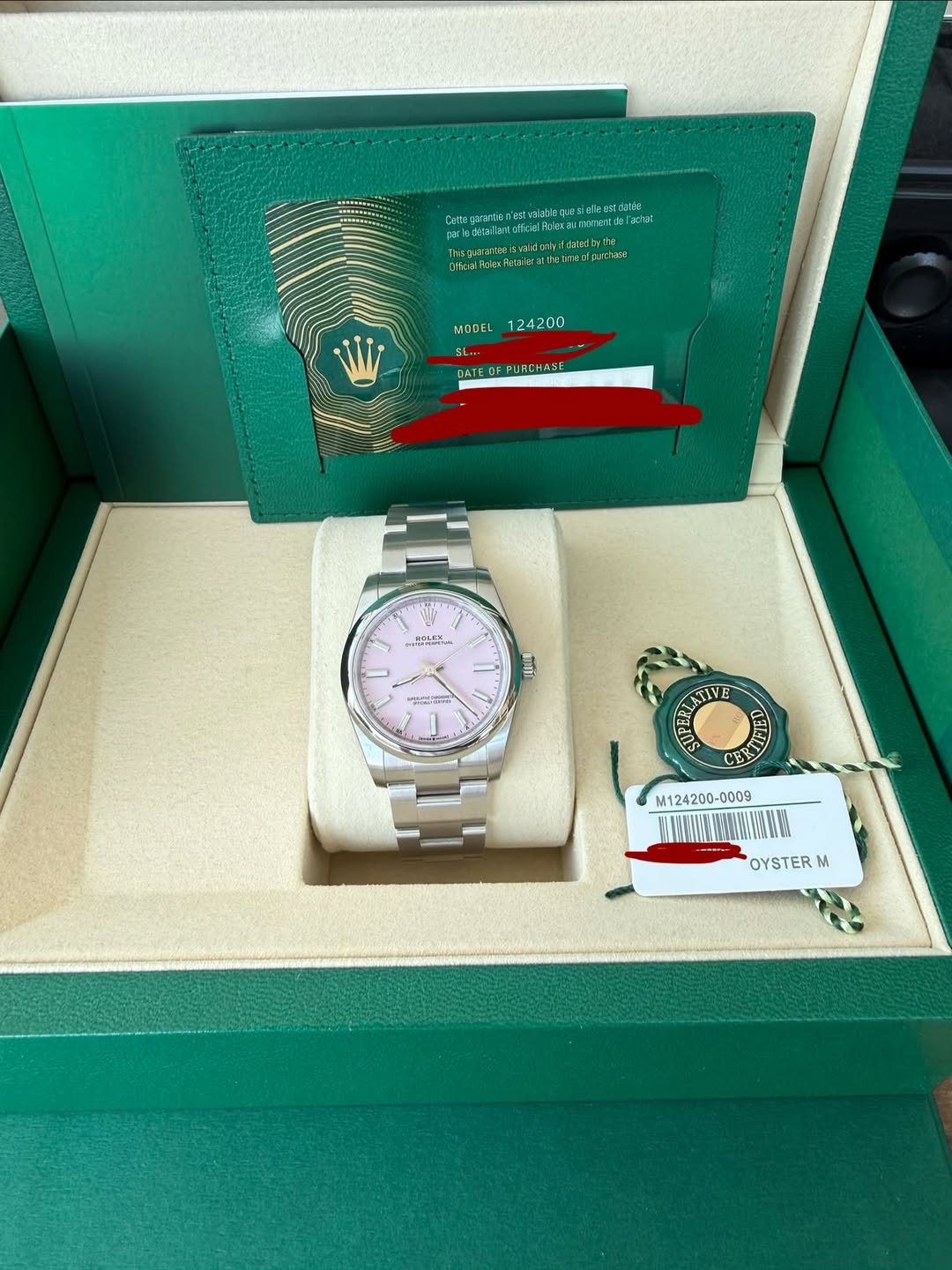 May be an image of wrist watch and text