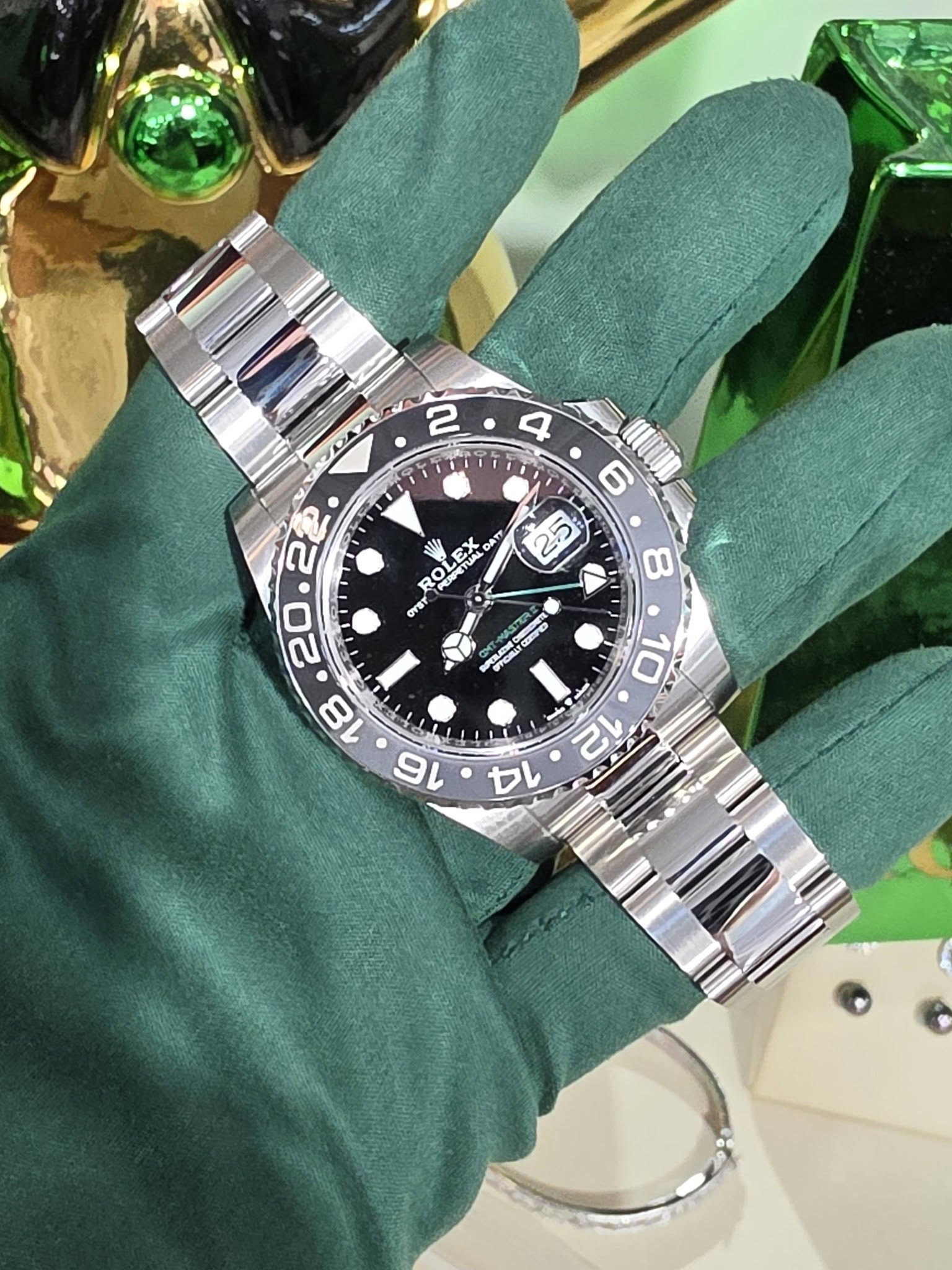 May be an image of wrist watch, cufflinks and text that says '2 4 ١ 6 if 10 8 ROLE LEX Ε.λ ለ ATY ROL PERPETUAL LVST BACEE LA C EIEO cro rT DAA '