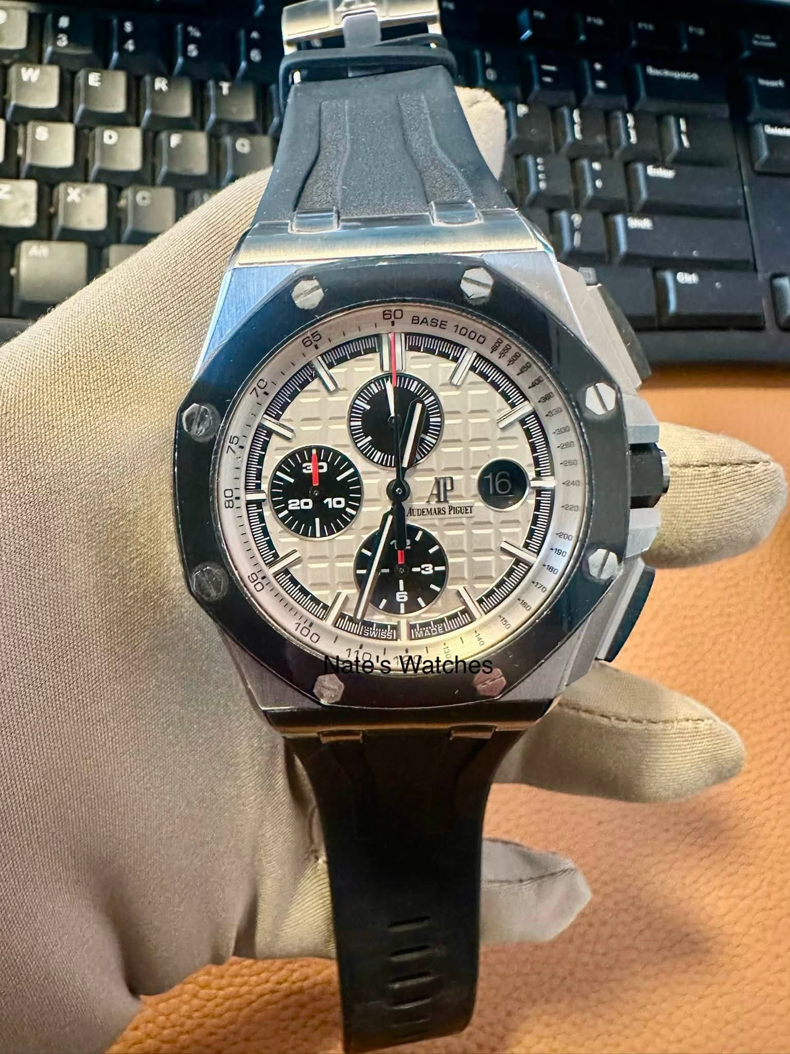 May be an image of wrist watch and text