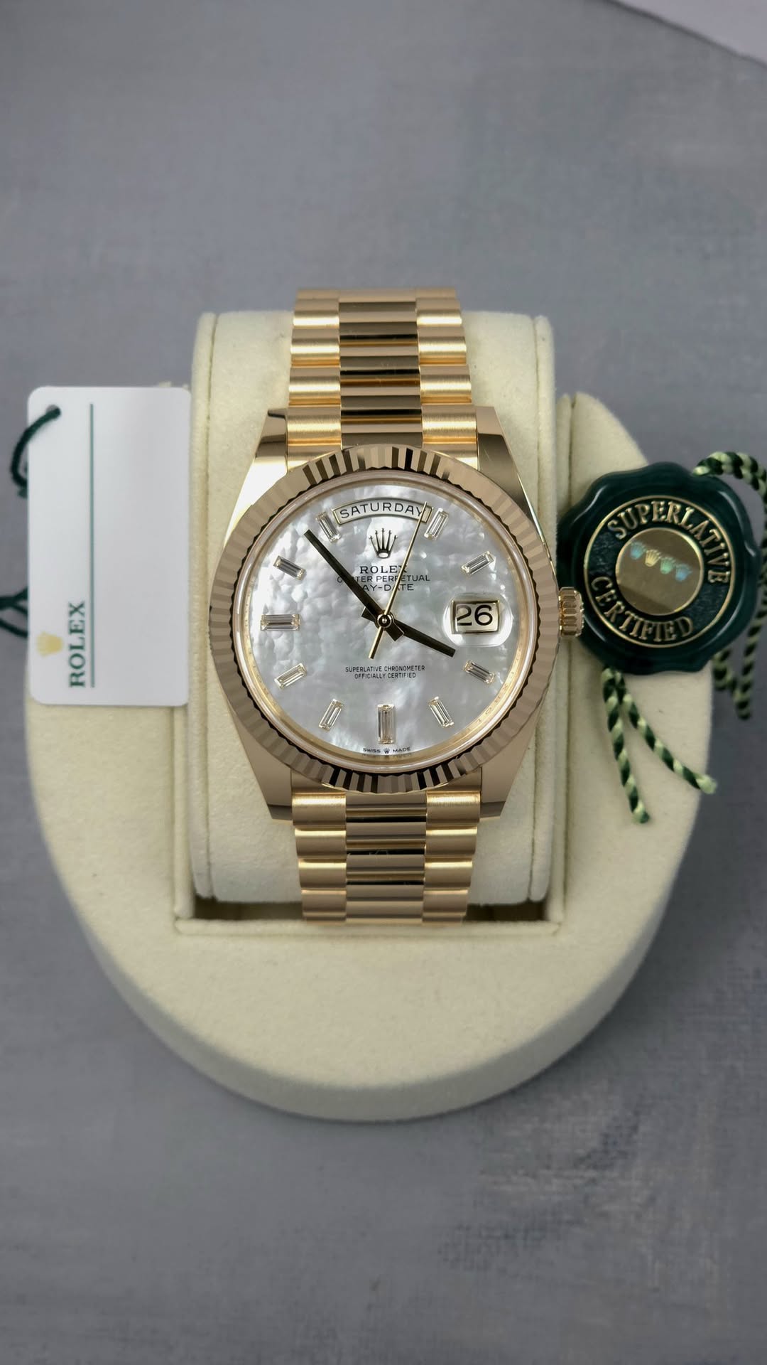 May be an image of wrist watch and text