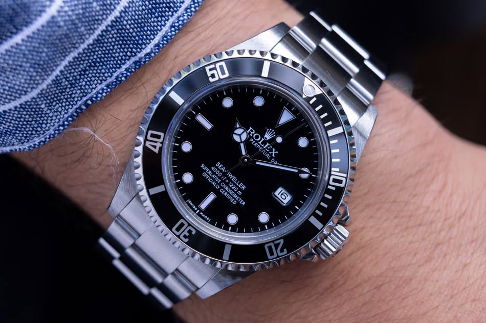 May be an image of wrist watch and text that says '50 40 ROLEX PERJO PERPE SUP OFFAI SUPERLA Ore 4000 SEA SEA- Pc ERTRME αοΝΟΙΩ 1220m C20 12ER WELLER AT 001=1236 FANE RLATIVECHP…