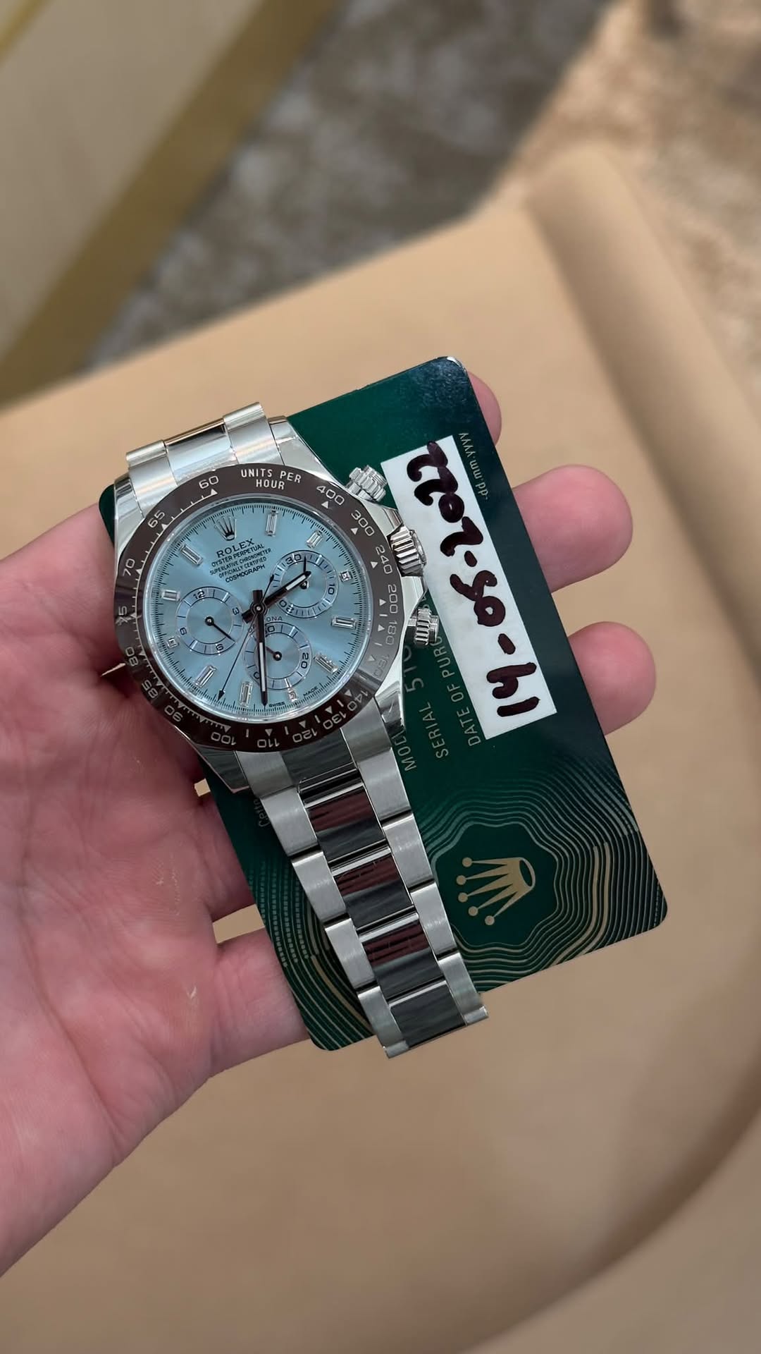 May be an image of wrist watch and text