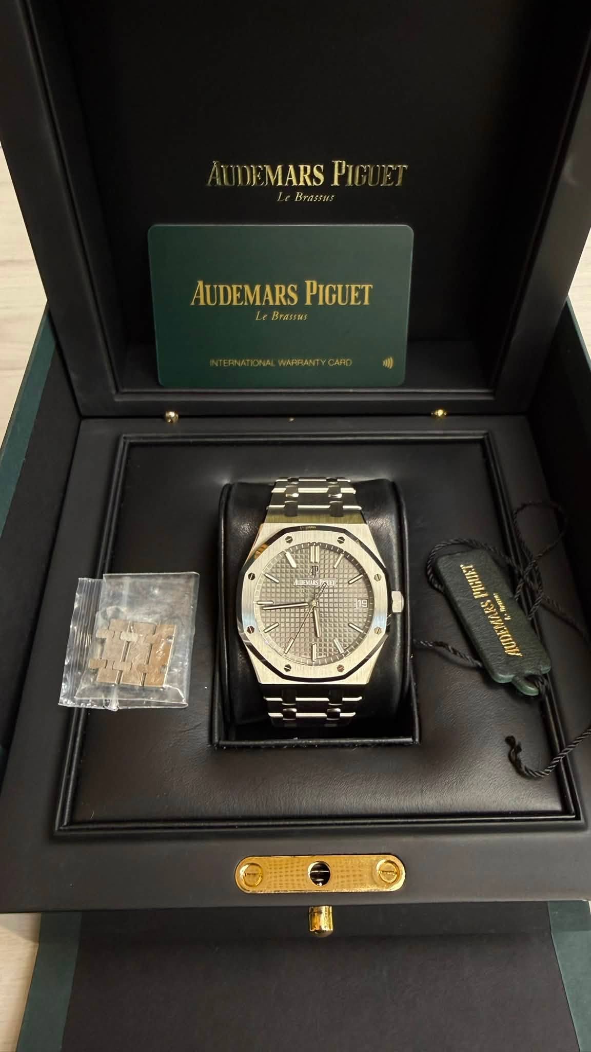 May be an image of wrist watch and text