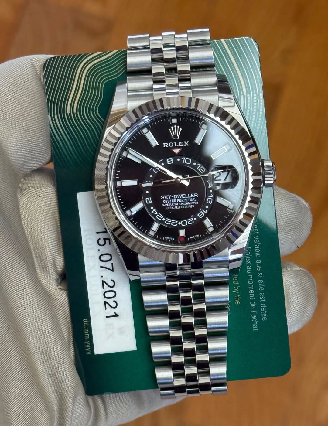 May be an image of wrist watch and text