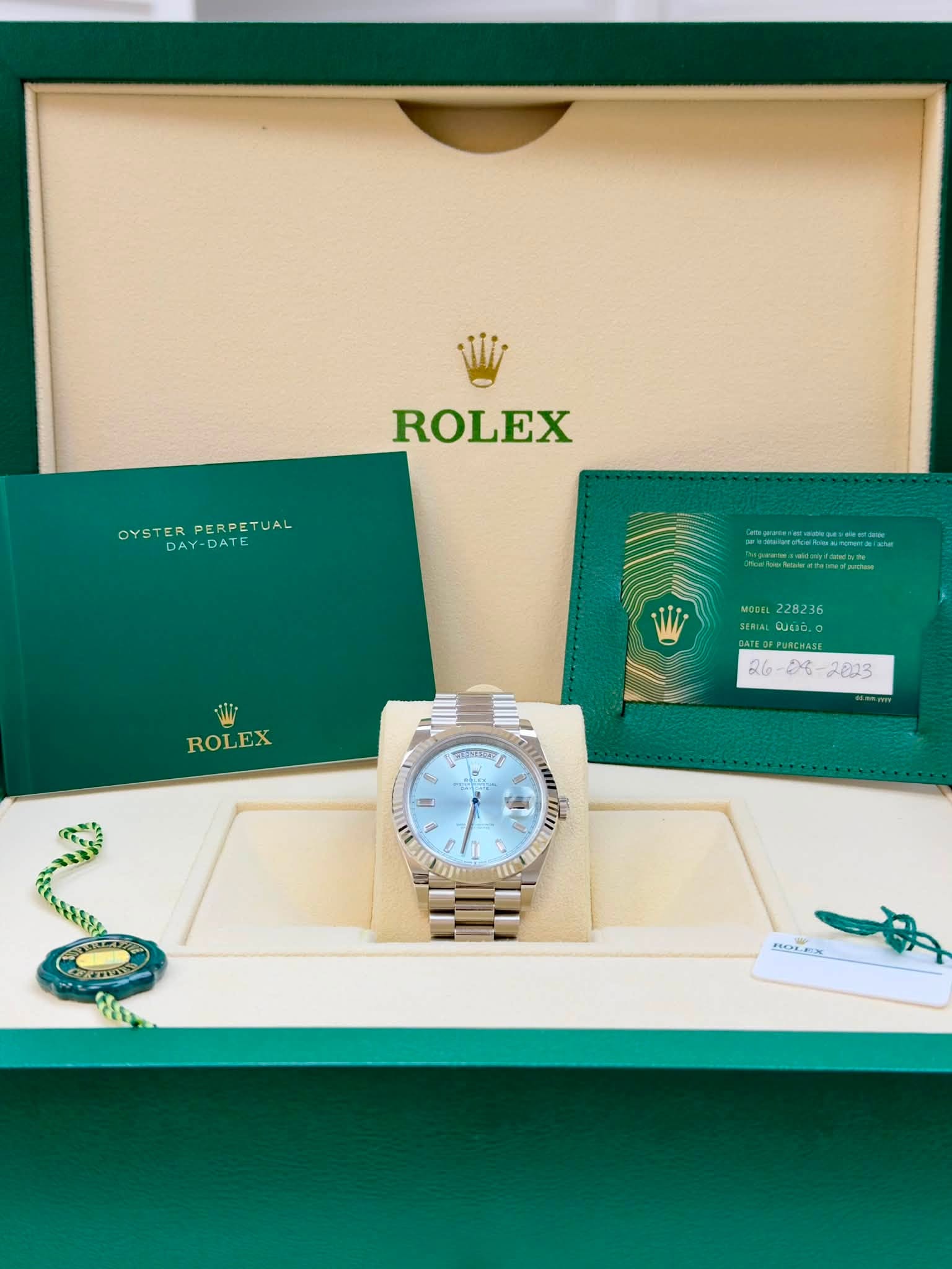 May be an image of wrist watch and text