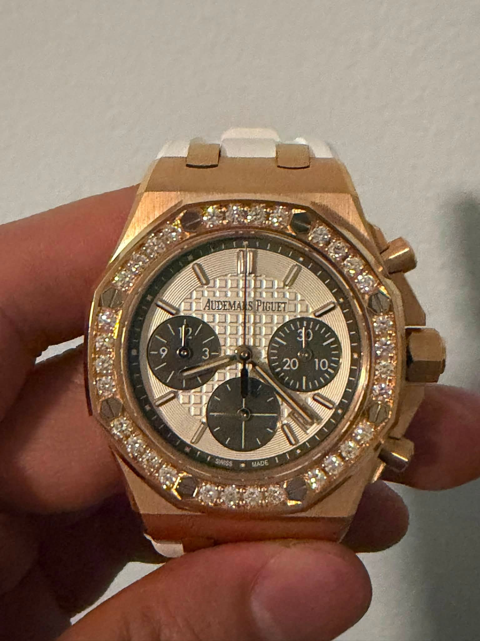 May be an image of wrist watch and text