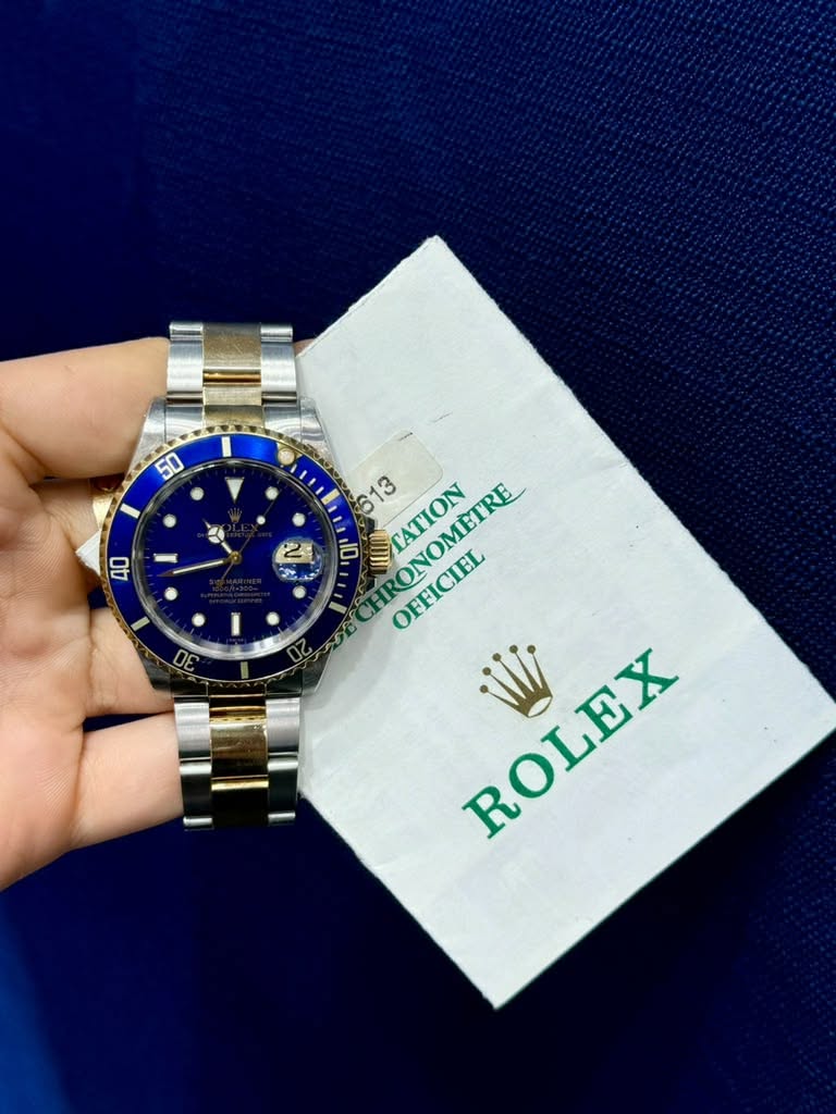 May be an image of wrist watch and text that says '50 公 AO 2 2 ዐጮ 613 613 MCATION HRONOMETRE ATION 0 OFFICIEL زیح HD0 ΣΟΙΒΣ ROLEX'