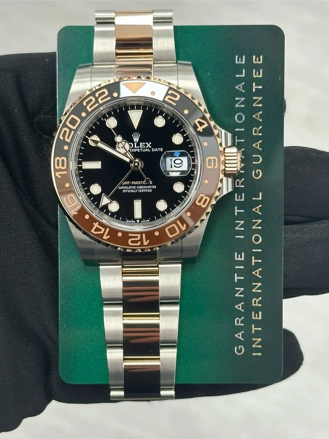 May be an image of wrist watch and text