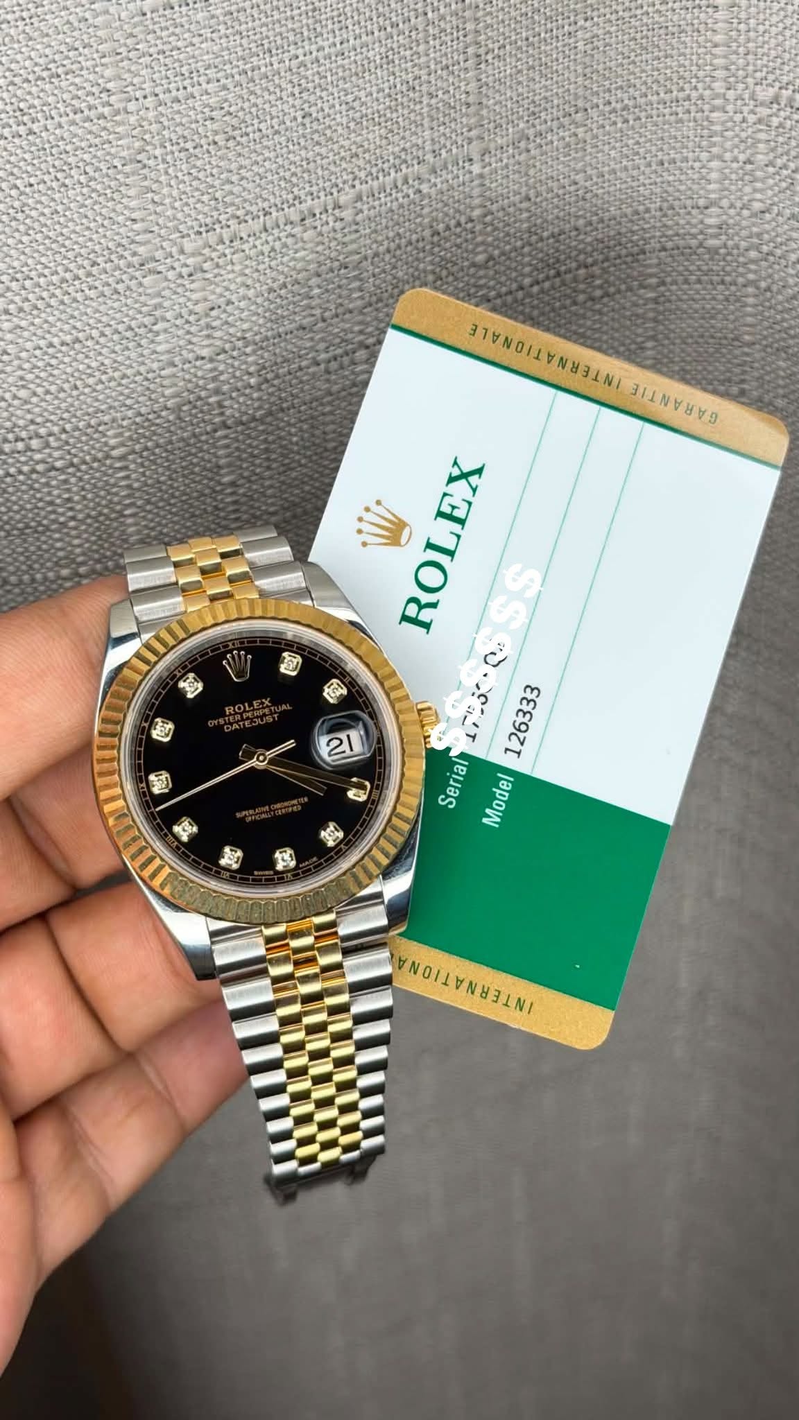 May be an image of wrist watch and text