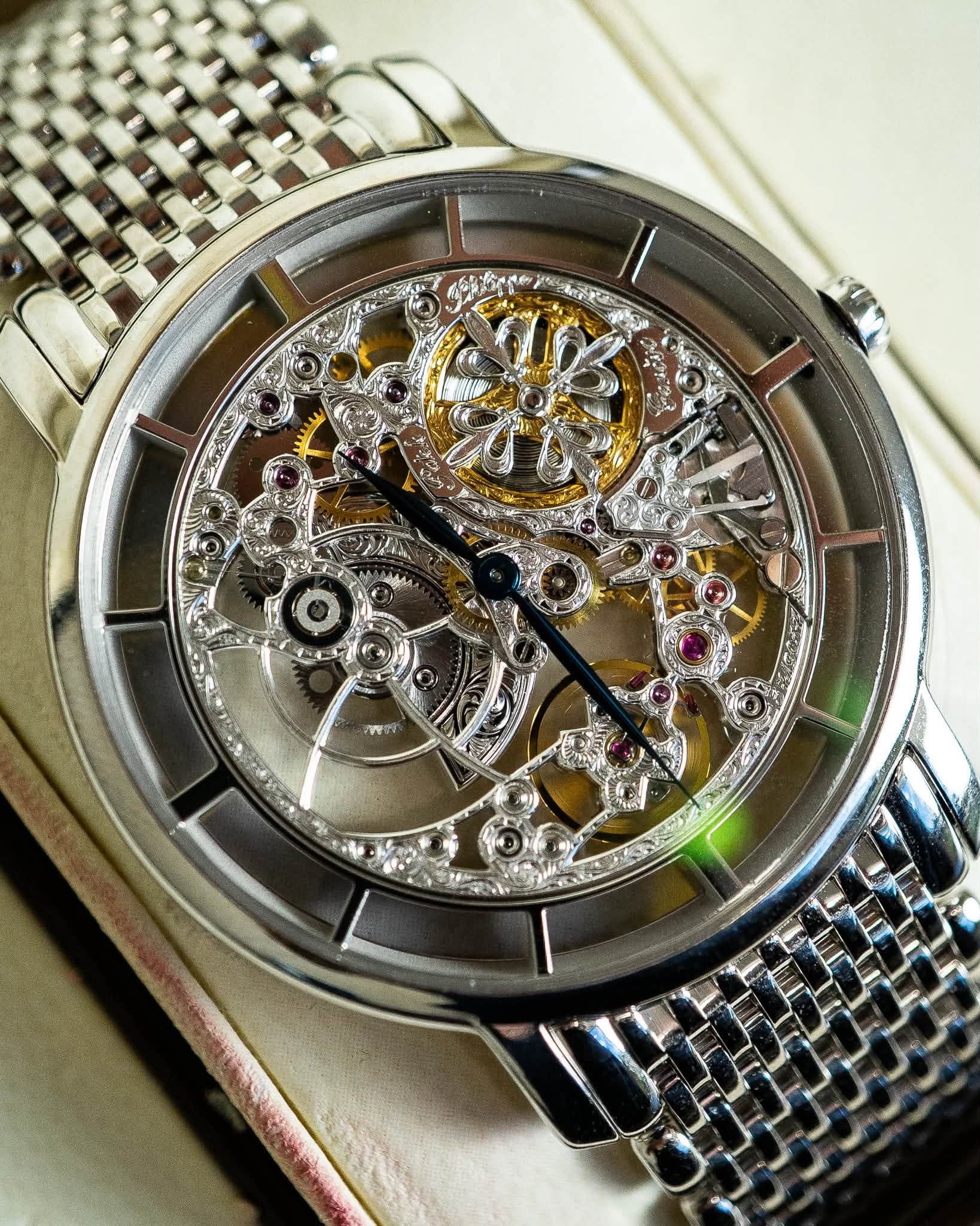 May be an image of wrist watch and text