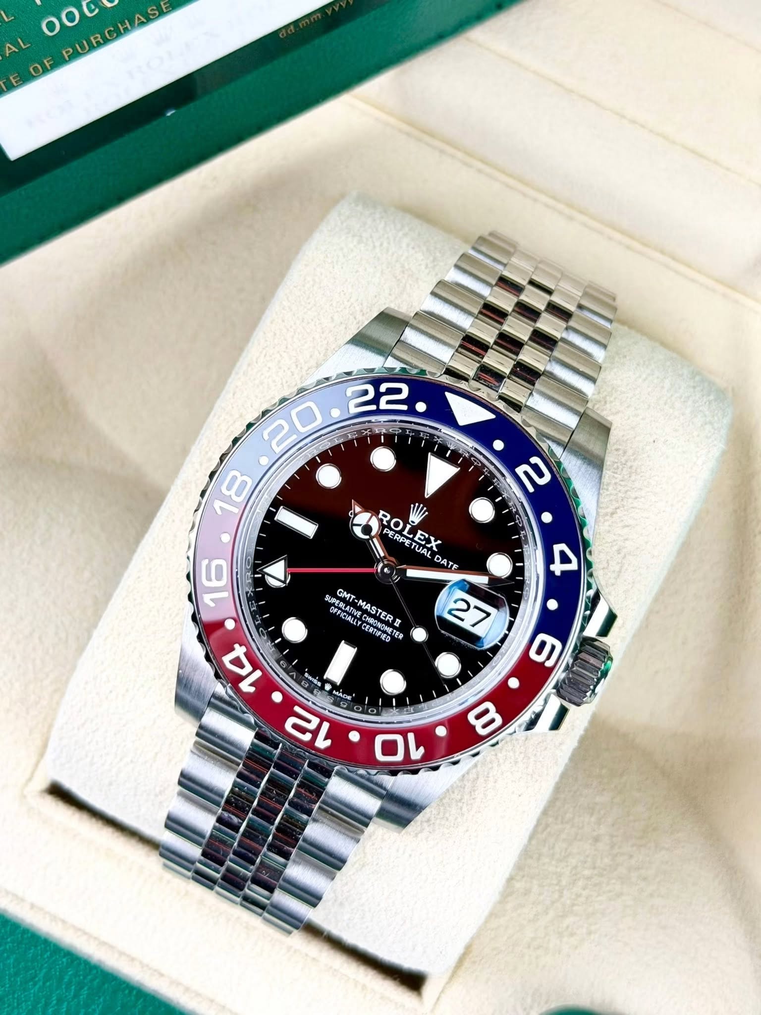 May be an image of wrist watch and text