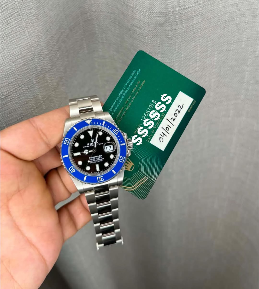 May be an image of wrist watch and text