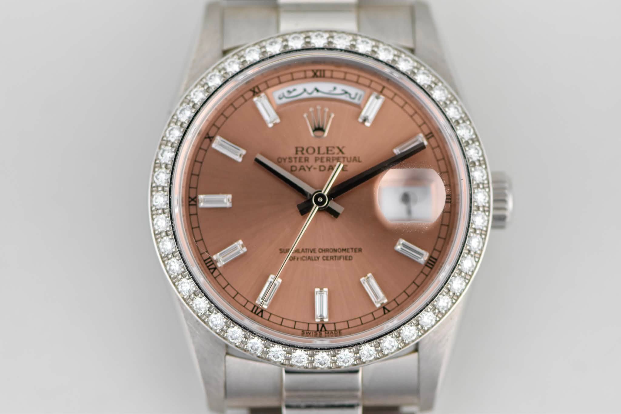 May be an image of wrist watch and text that says 'الحهت هلتد الحد ROLEX OYSTERPERPETUAL YSTAN-DA YSTERPLR CRPETUAL TUAL DAY-D/ OFCIALYCERTIFIED MOETER LATIVE CHRONOMETER…