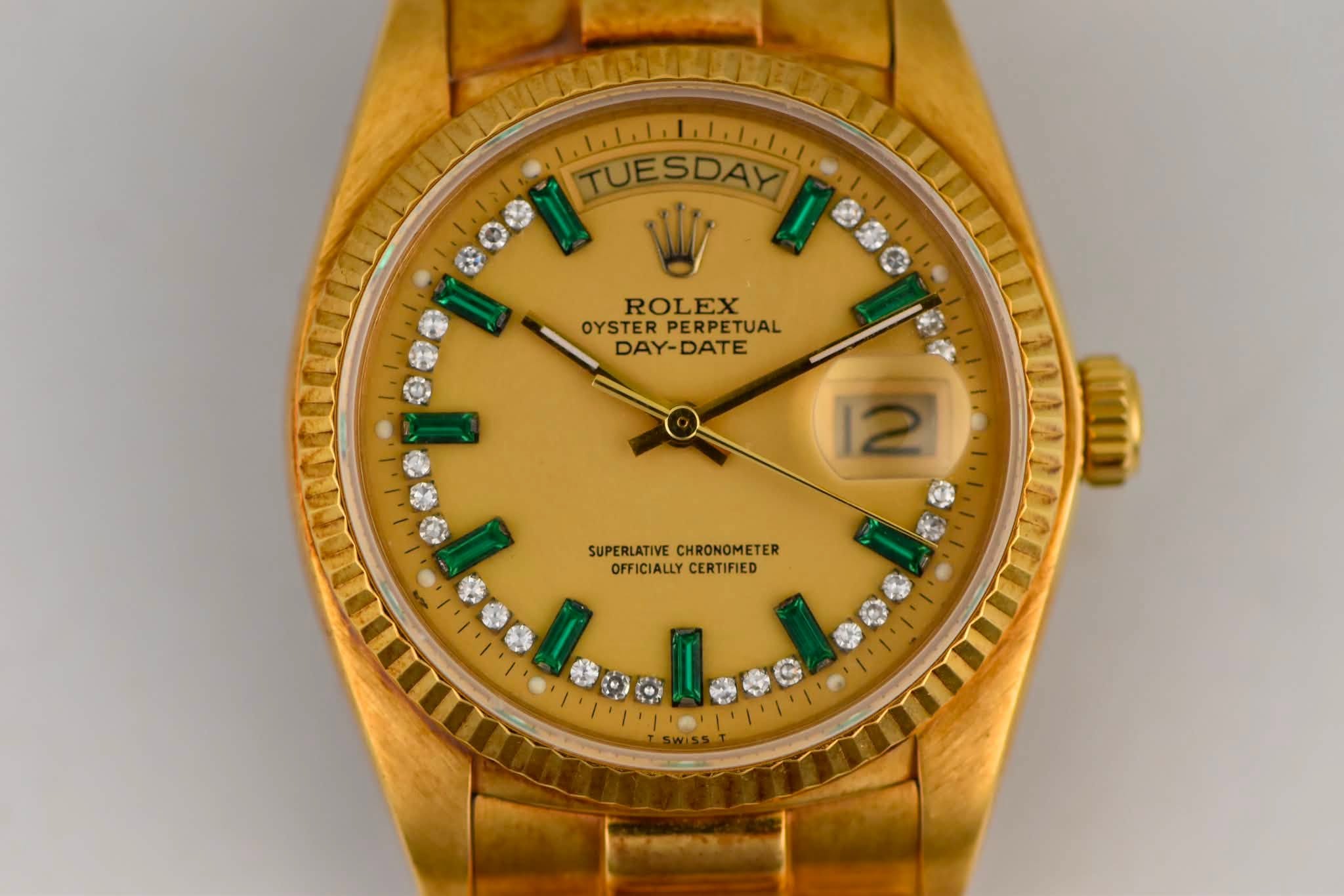 May be an image of wrist watch and text that says 'TUESDAY W 參务 ROLEX OYSTER PERPETUAL DAY-DATE 母 12 SUPERLATIVECHRONOMETER SUPERLATIVE CHRONOMETER OFFICIALLYCERTIFIED OFFICIALLY…