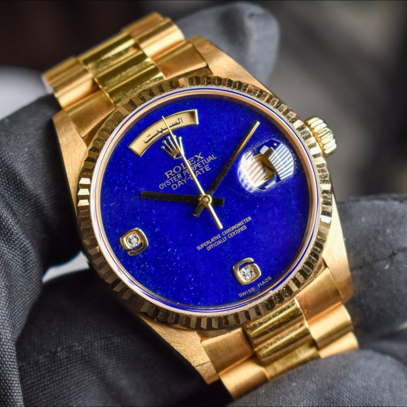 May be an image of wrist watch and text