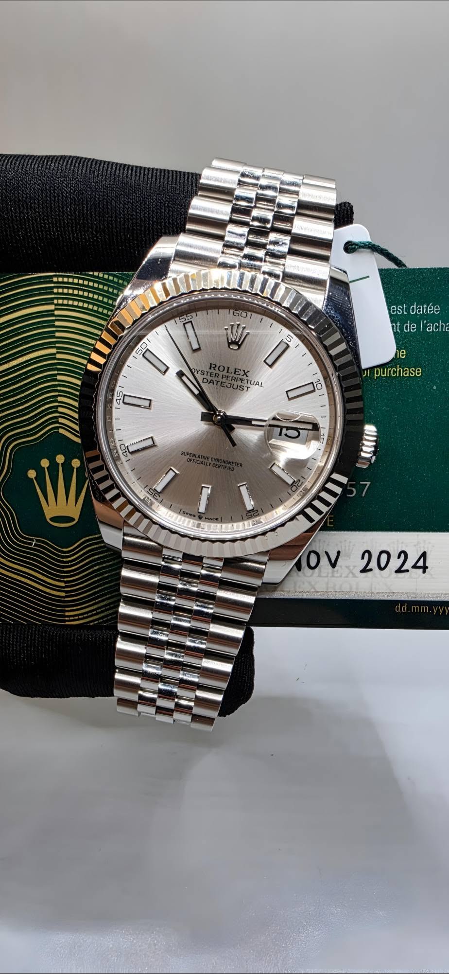May be an image of wrist watch and text