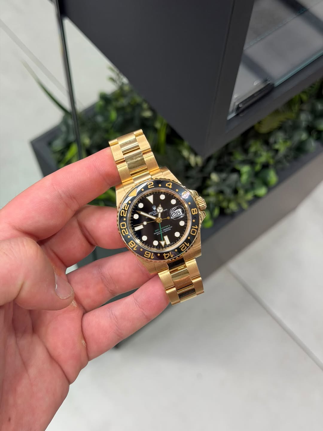 May be an image of wrist watch and text