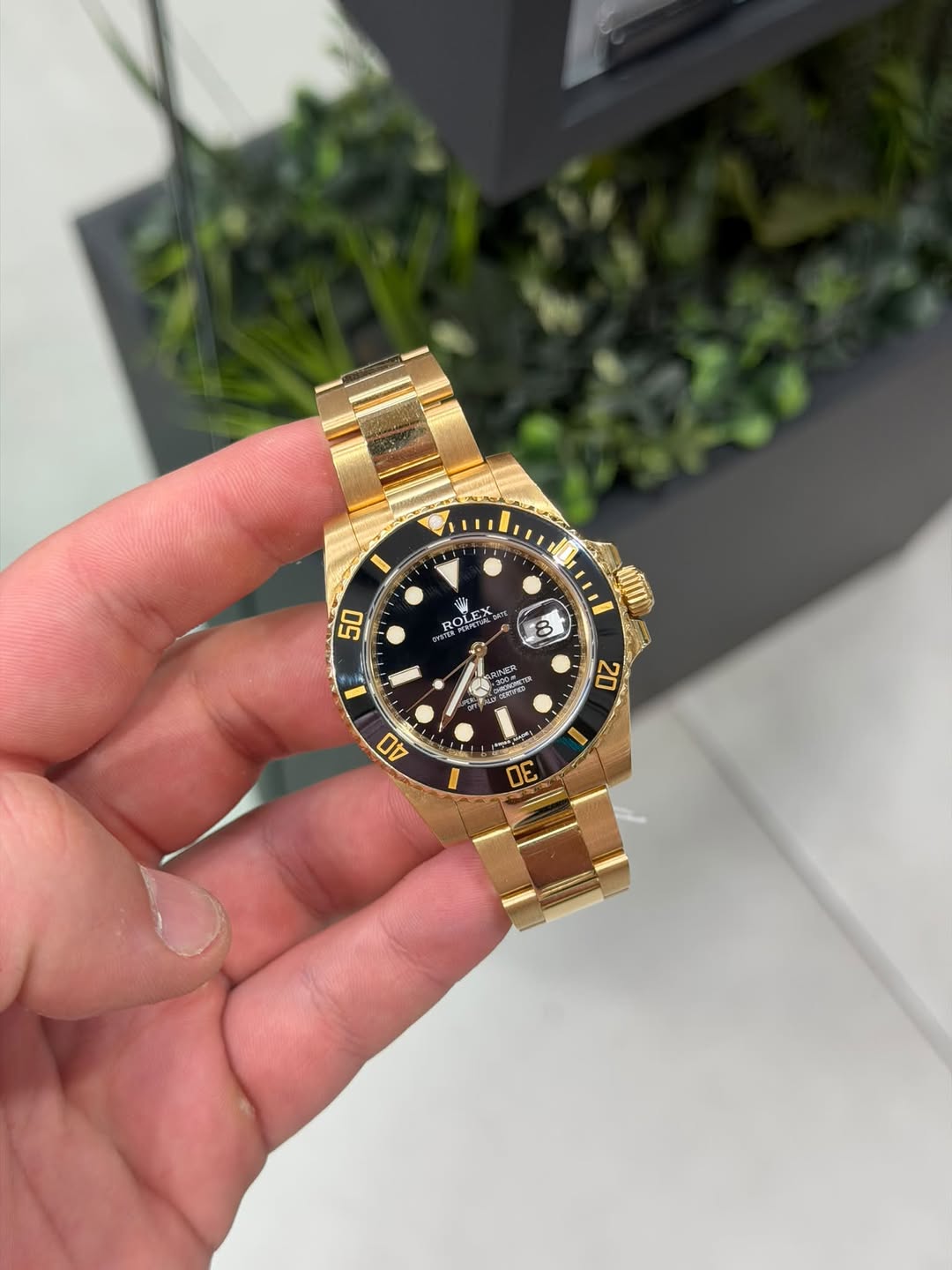 May be an image of wrist watch and text