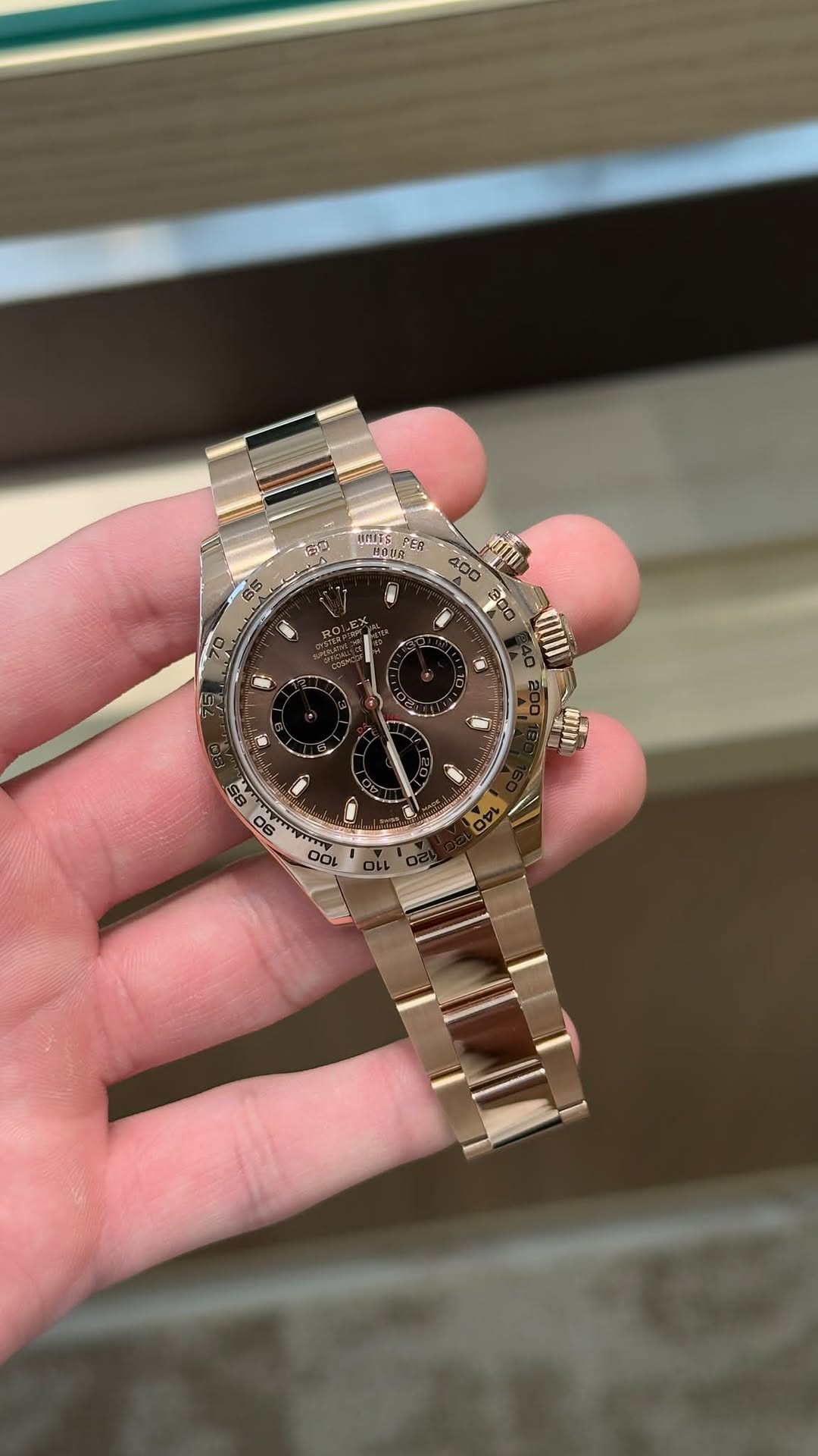 May be an image of wrist watch and text