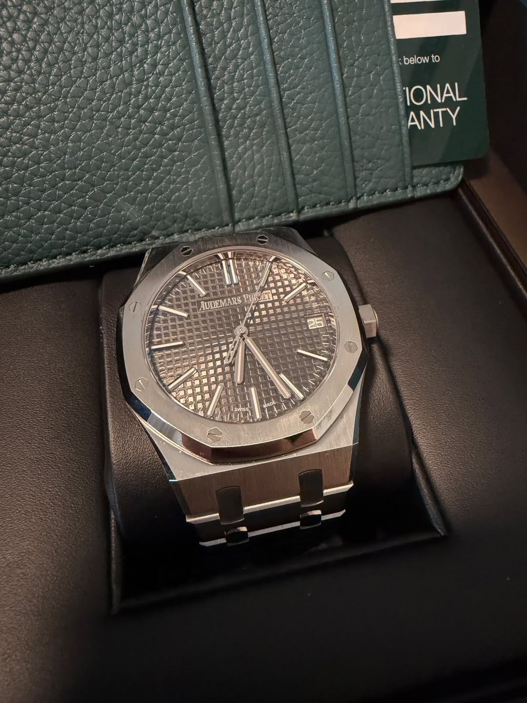 May be an image of wrist watch and text