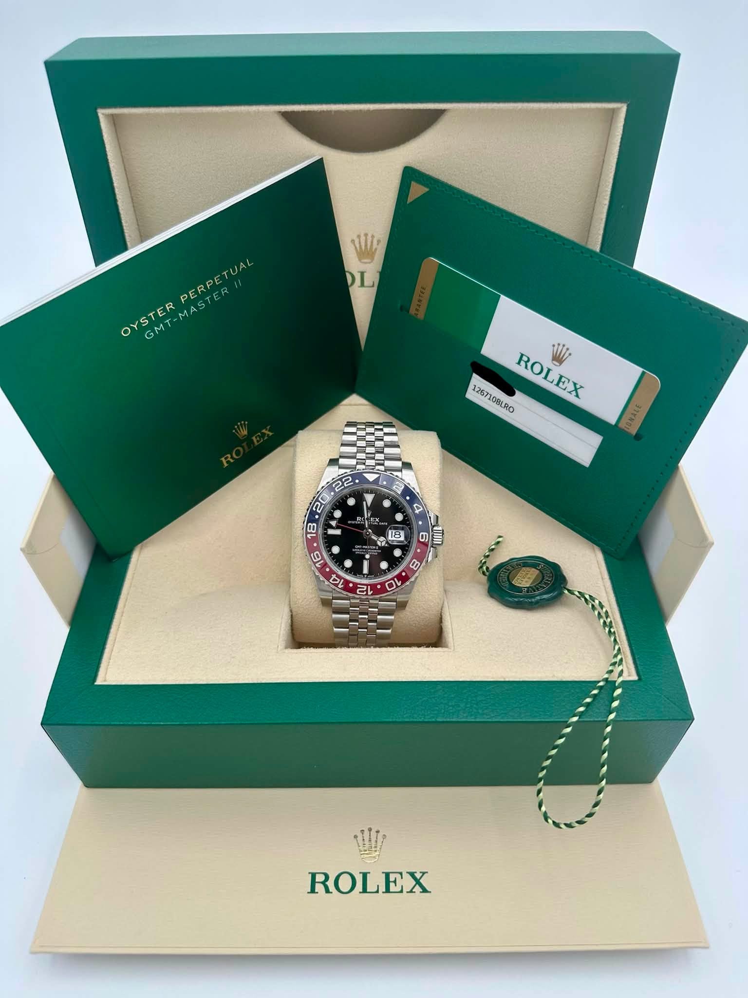 May be an image of wrist watch and text that says 'WI DL PERPETUA PERP OYSTER OYSTERPERPETUAL MT-MAS OYS GMT 1117 126710BLRO OIBLRO ROLEX SMASE 2 a 25 20 18 ウ E E 6 6 A M 22 10…