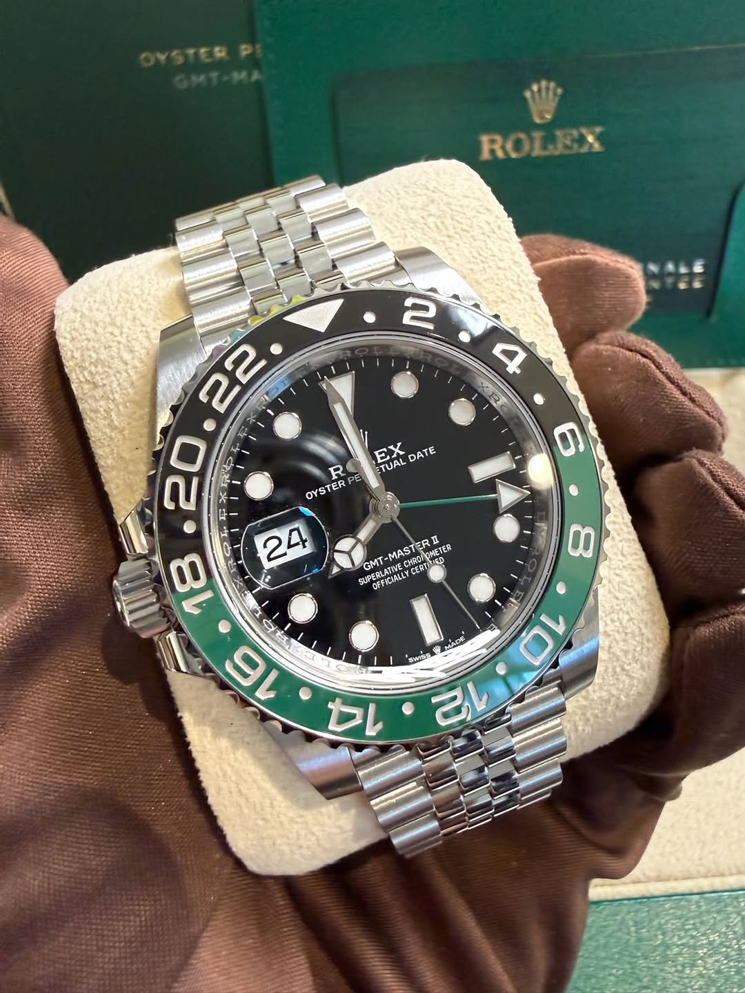 May be an image of wrist watch and text