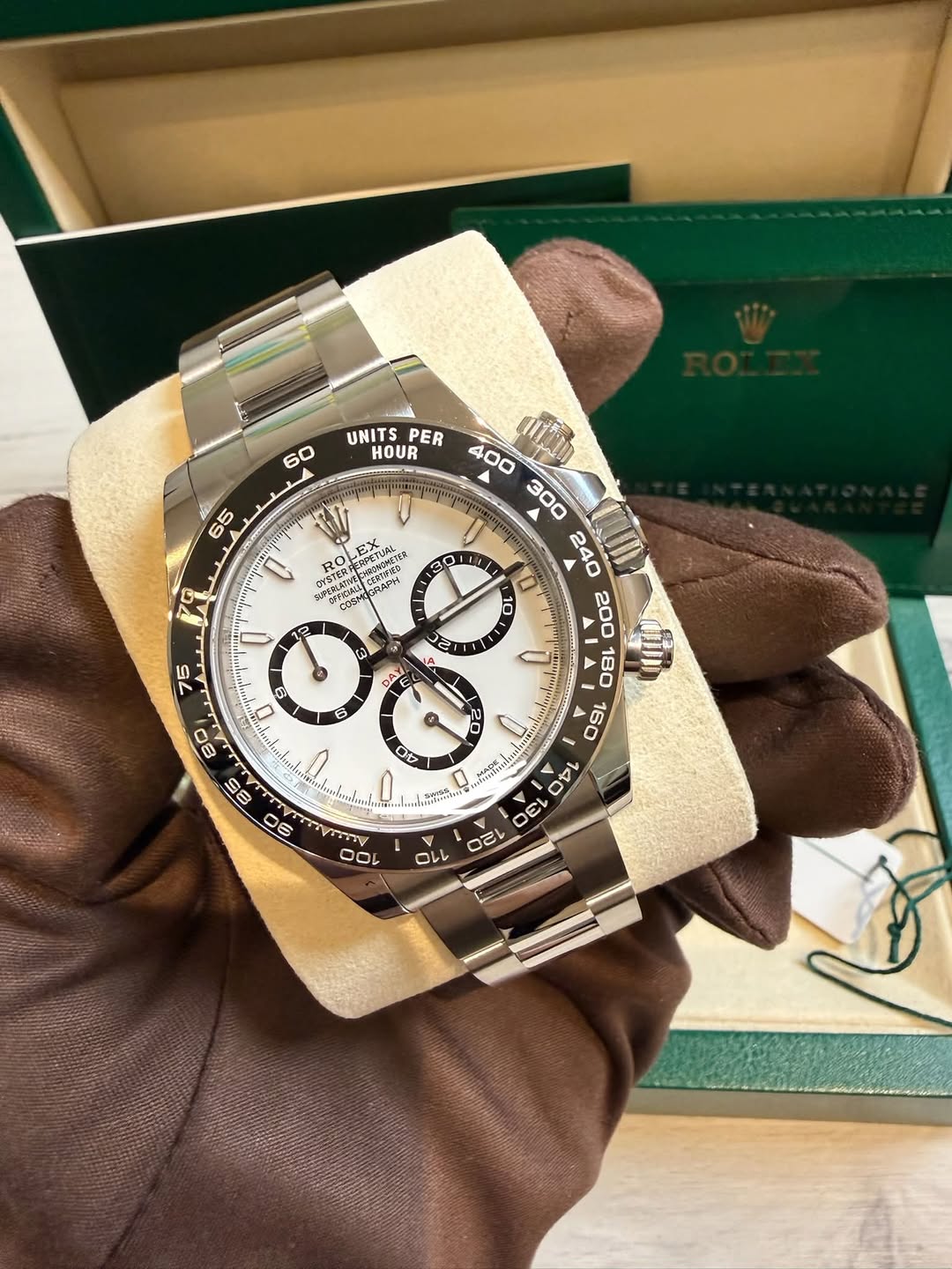 May be an image of wrist watch and text