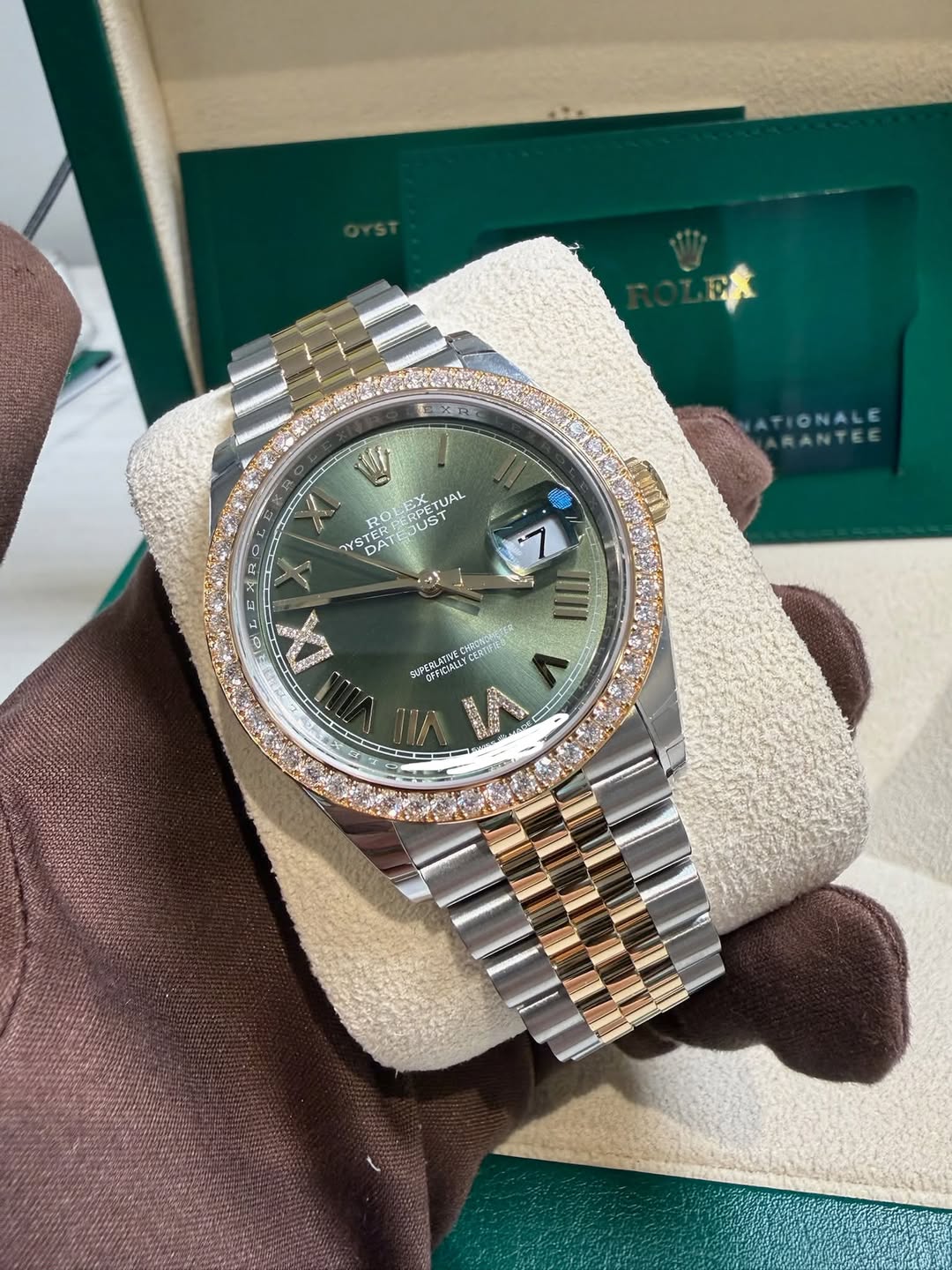 May be an image of wrist watch and text