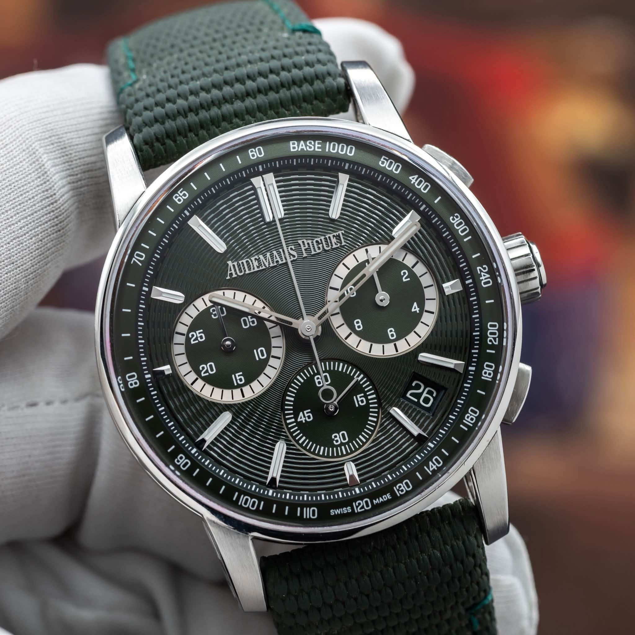 May be an image of wrist watch and text that says '60 BASE BASE1000 AUDEMASFIGUET ΛΟ3 AUDEMAIS PIGUET 18 8U ป edieel い 130 110 WISS 20 MADE'