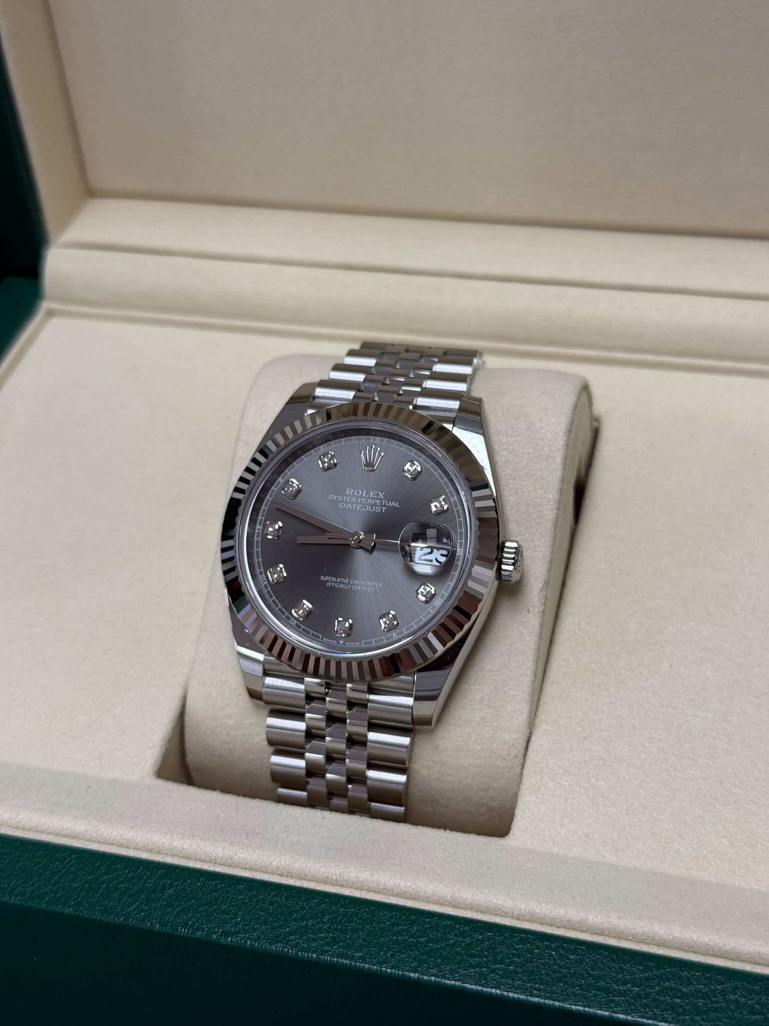 May be an image of wrist watch and text