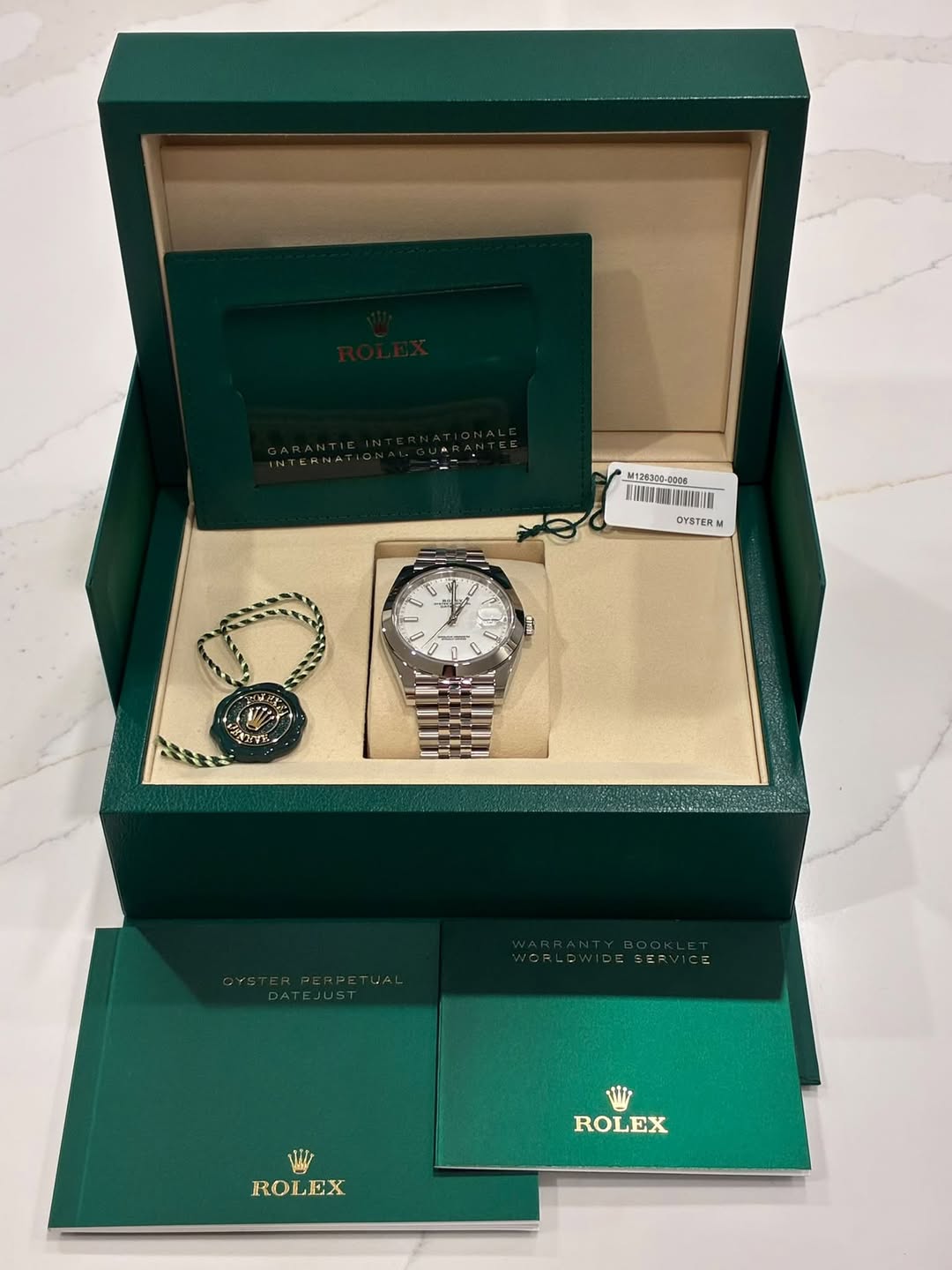 May be an image of wrist watch and box