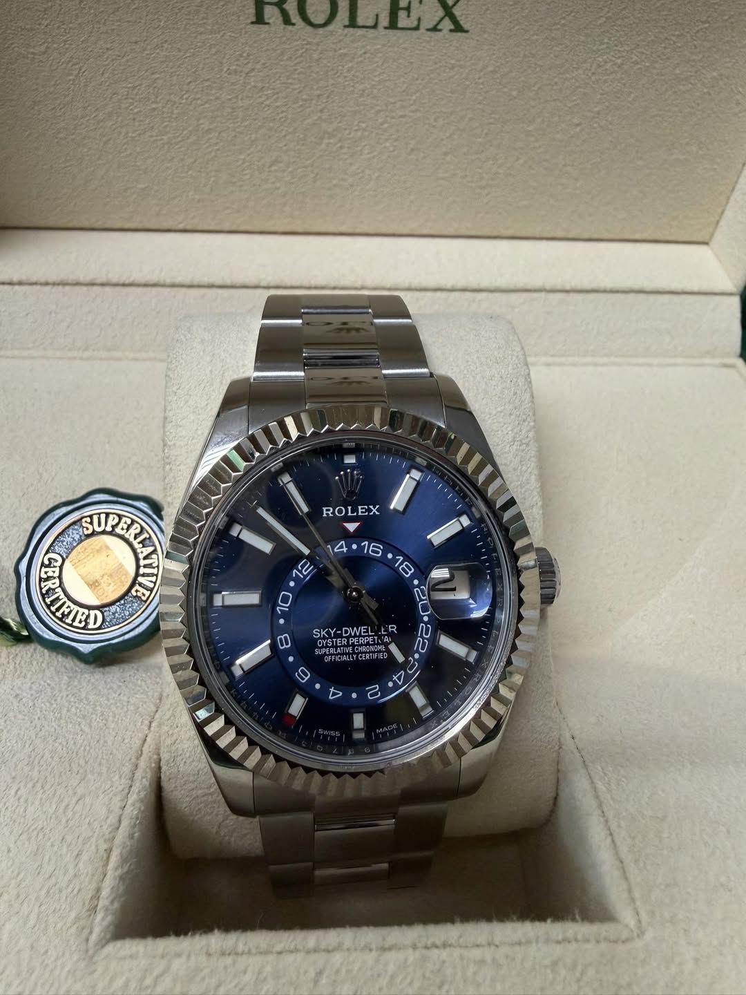 May be an image of wrist watch and text