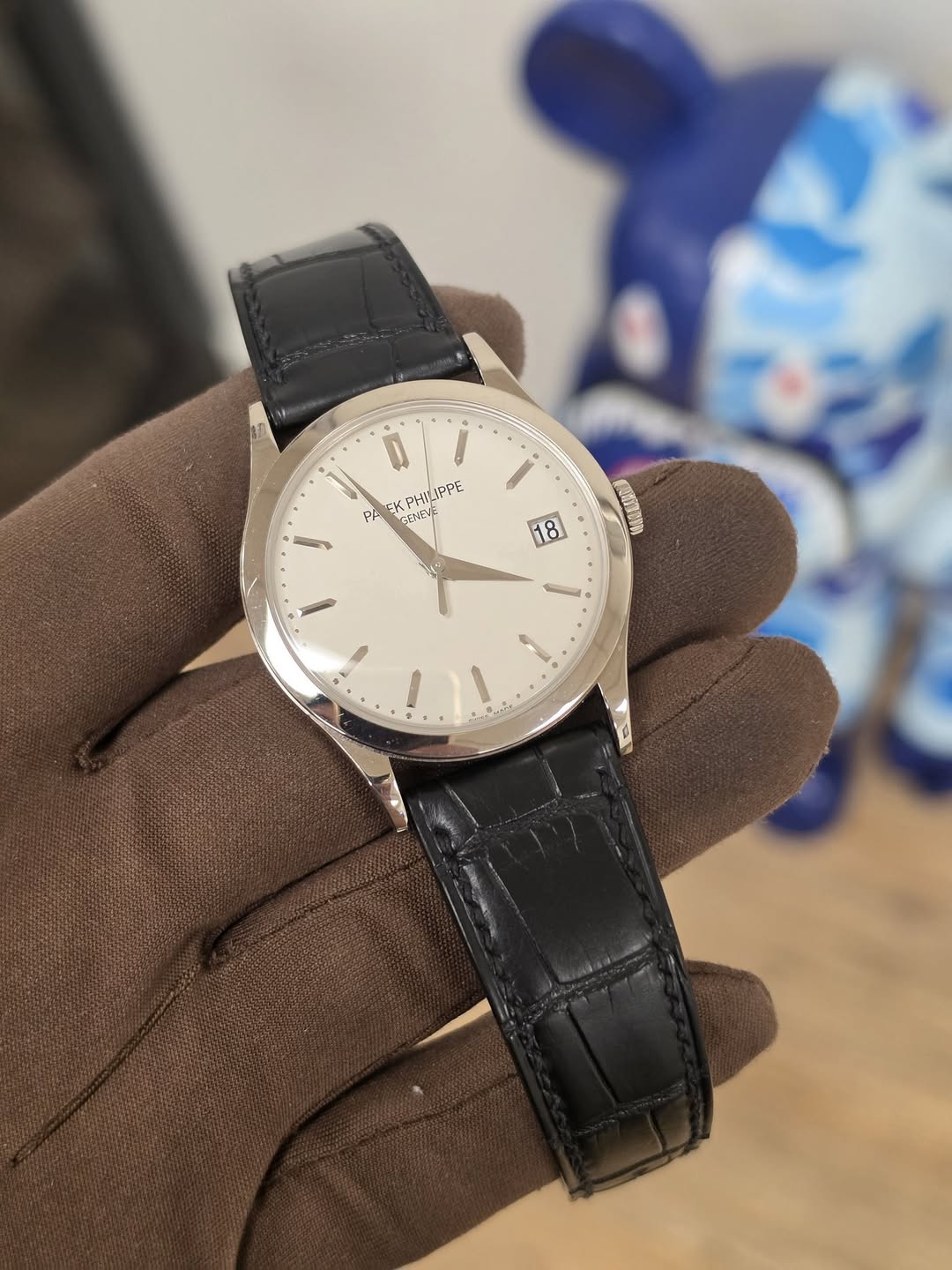 May be an image of wrist watch and text