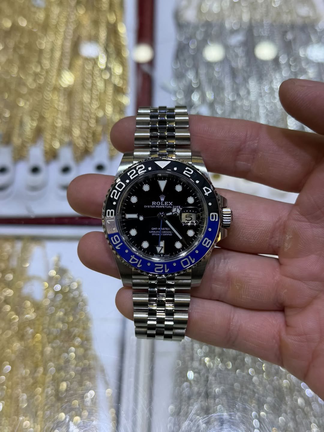 May be an image of wrist watch and text
